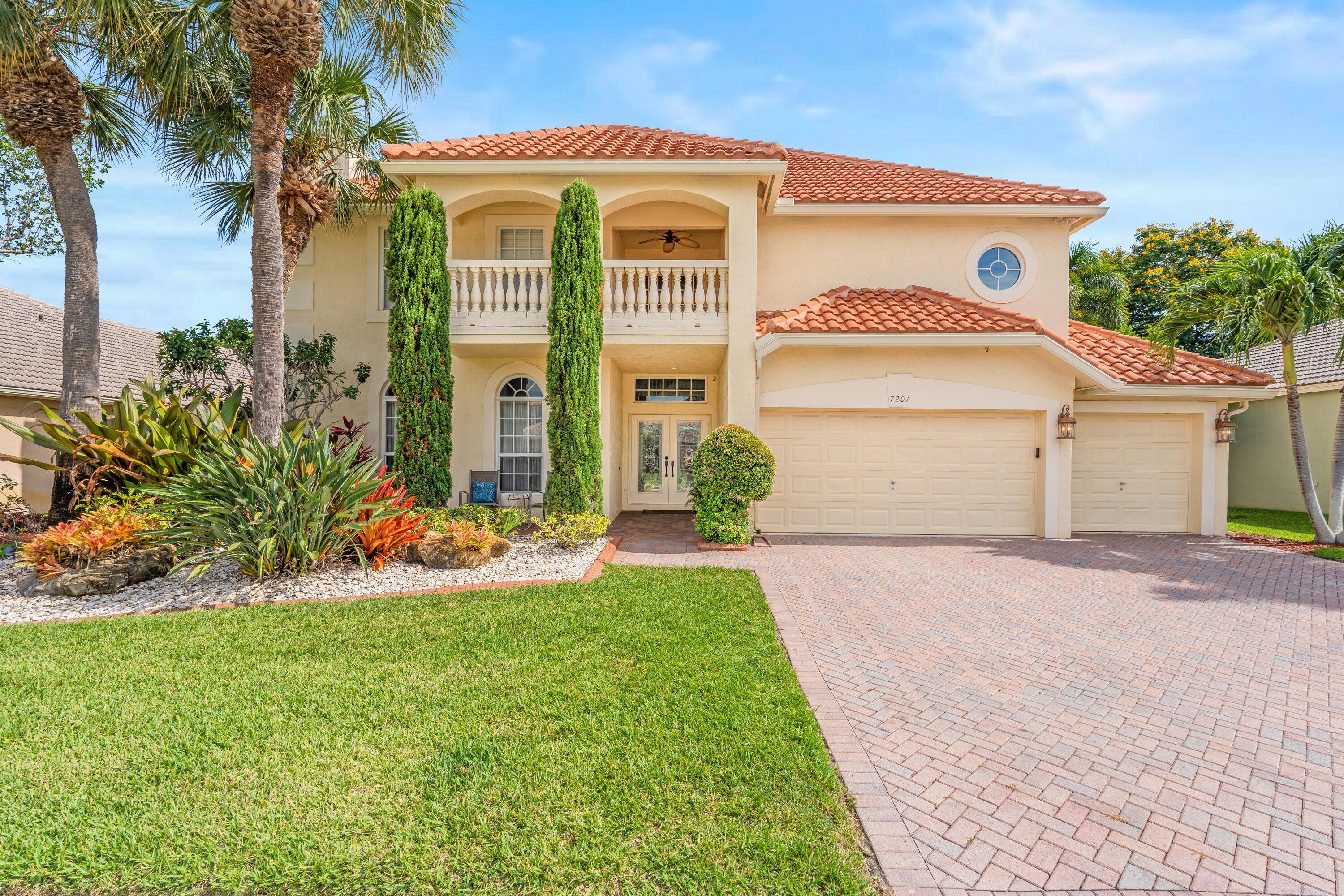 This won't last!  Relax or entertain in perhaps the largest home on one of the best lake view lots in the desirable enclave of Bristol Lakes, a subdivision of Aberdeen - where Country Club membership is available, but not required.  This spacious home is well maintained, as the current owners have replaced the roof, impact windows, both AC's, the water heater, pool equipment and are the original owners of all appliances - including the gas stove with pot filler, dual ovens and dual dishwashers.    Enter the home through the decorative front doors onto the revamped real wood floors throughout and catch a glimpse ahead of the recently renovated and automated pool area that you can control from your phone, as well as the lake behind it.  Throughout the home you will find h igh ceilings with crown moulding and upgraded lighting, all on dimmer switches. To your left is a wood burning fireplace in the open living/dining space.  The custom kitchen with an island has easy access to the dining room and breakfast nook and tons of cabinet and drawer space.  Also on the first floor is a large living room with built—in entertainment unit and wainscoting throughout. The first floor also includes a well sized guest room, gorgeous and oversized renovated bathroom with cabana door and the laundry room.  Take the winding staircase up to the second floor where newly installed flooring in the hallway will lead you past the primary suite to the remaining bedrooms and large bathroom with dual sinks and an updated shower.  The primary suite consists of a room large enough to have a sitting area and a renovated bathroom with two closet spaces that any buyer would crave.  Walk around the upstairs hallway and at the end you find a huge room that can be used as a game room, media room, den or even a sixth bedroom.  This large "rec" room also has easy access to the attic where, along with all the many closets and three-car garage that exist in the home, you can keep anything you want to store for another day.  The outside is right on par with the inside, as you can relax in the screened, covered patio or head outside to the beautifully updated pool and hot tub area on clean pavers with plenty of room for outdoor seating and entertaining, and already includes a fence around the yard and a protective child fence around the pool area for your family or guests if needed.  The area includes one of the few homes in the neighborhood with a backyard to play in both inside the gate and, if you follow the path by the lake two houses down, there is a giant open field to use for games and activities.  This home has everything you could ask for and more!  The HOA includes landscaping (with irrigation maintenance), tree-trimming, cable and internet (if you choose), common area maintenance, gated security and home security.  There are A-rated public schools and many private schools in the area.