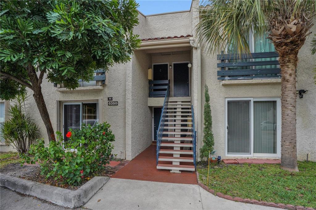 Don't miss this super cute, ground floor corner unit.  Kitchen has been updated with granite countertops & new appliances. Cozy Eat-In Kitchen plus breakfast bar. Bathroom has been updated with new opaque glass shower doors . Nice size main bedroom and second bedroom ideal for single bed or home office. Unit has full size side by side washer/dryer. New Tankless Hot Water Heater Recently Installed & Electric Panel Replaced. Screen Patio finished with wood plank floor and door open to outside area. This condo is across from pool and gym complex and you park right in front of your unit. Accordion Hurricane shutters for windows. Being sold Furnished for Seller Convenience. Small Pet under 20 lbs OK. Centrally located under 3 miles to the beach and quick access to I-95. Come See Today!