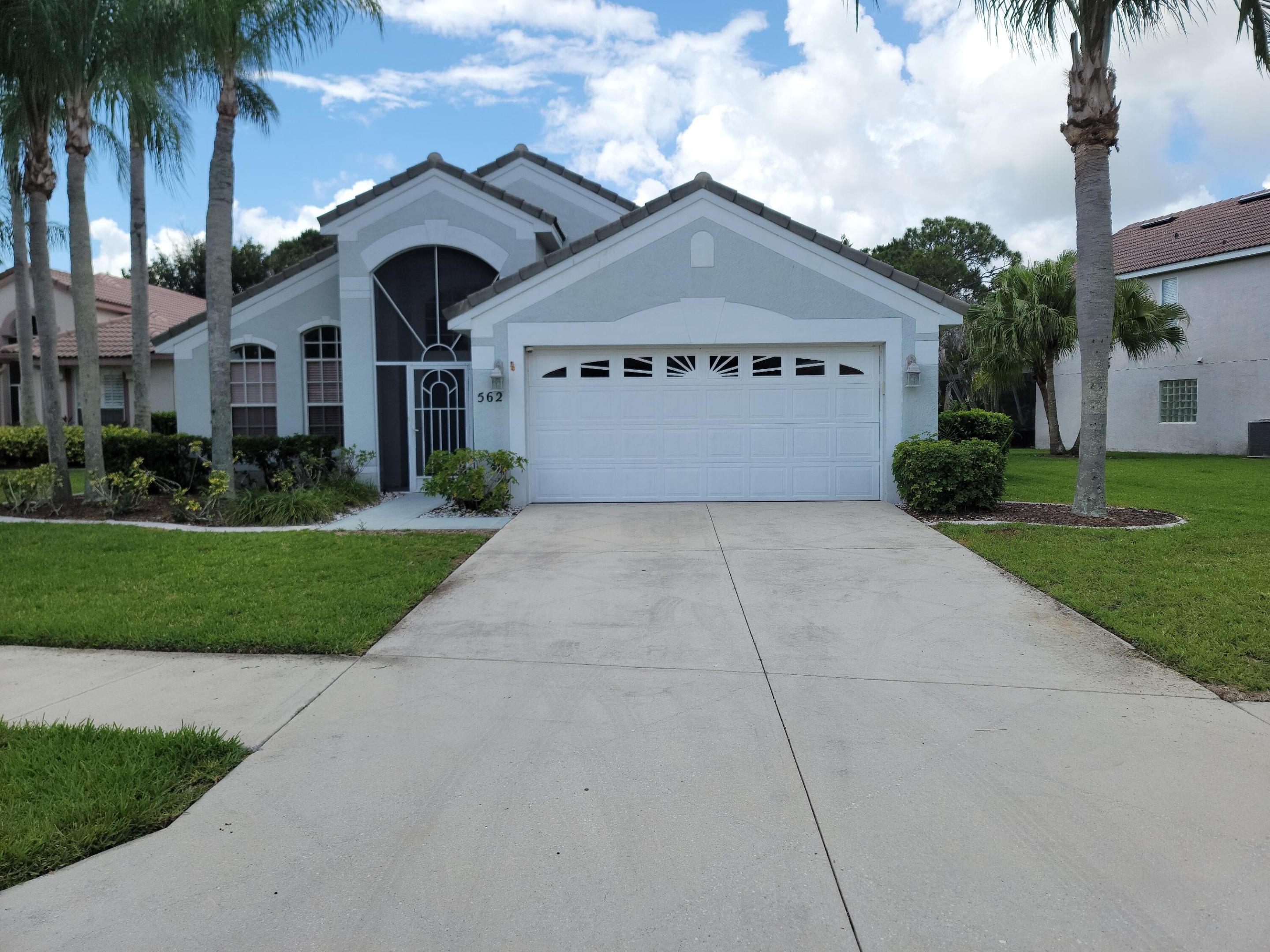 Welcome to the highly desirable Lake Charles community of Port Saint Lucie! This beautifully updated 3-bedroom, 2-bath home offers the perfect blend of comfort, style, and Florida living. Situated on a quiet cul-de-sac, the home features a spacious split floor plan, soaring vaulted ceilings, and elegant diamond-pattern tile flooring throughout. The remodeled kitchen showcases granite countertops, stainless steel appliances, and convenient bar seating, while both bathrooms have been tastefully renovated with modern finishes and floor-to-ceiling tile accents. Step outside to enjoy a large screened-in patio overlooking an oversized private backyard with plenty of room to relax, entertain, or add a future pool.     The home also includes a 2-car garage and is just steps from Lake Charles' newly renovated clubhouse featuring an Olympic-size pool, hot tub, tennis courts, pickleball, basketball courts, playground, and more. Residents enjoy 24-hour gated security and a prime location close to shopping, dining, PGA golf, major highways, and Clover Park, home of New York Mets spring training. This move-in ready home is a rare opportunity in one of Port Saint Lucie's most sought-after communities.  Lake Charles is a place where residents can enjoy many recreational amenities such as a manned security guard gated entry, a beautiful Beach Clubhouse with a magnificent heated pool & spa, library, media center, lighted tennis/pickleball courts, basketball court, 2 shuffleboard courts, bocce court, horseshoe game, playground, picnic with BBQ areas, jogging, biking, preserves and connecting lakes for boats that do not run on gas. Association fees also include landscape care, basic cable and internet.  All documents and application can be found on the website LakeCharlesHOA.com as well as further information about the community.