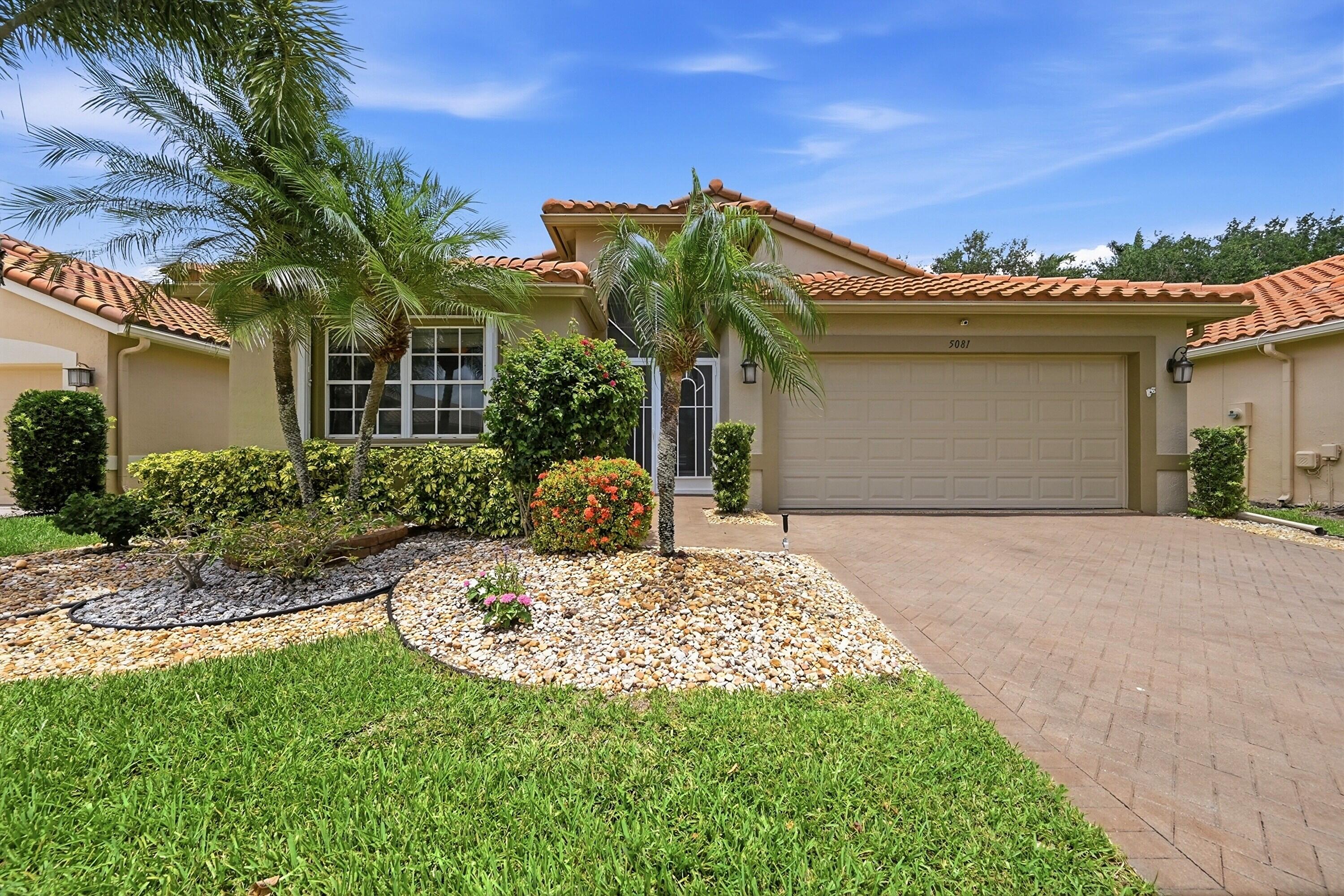Welcome to this FRESHLY PAINTED, spacious TRUE 3 bedroom/2 bath home in the highly sought, guard gated resort style community of Cascade Lakes! This move-in ready home offers peace of mind and major insurance savings with a 2021 roof, 2022 AC, full accordion shutters, and hurricane impact garage and front doors. Inside, you'll find NO carpet with ceramic tile throughout and LVP floors in the bedrooms, spacious closets throughout with additional shelving, updated laundry room with cabinetry and generous counter space, fresh interior paint, new high baseboards, and vaulted ceilings. Modern living is enhanced with comprehensive smart home features, including complete smart lighting, security cameras, garage door opener, front door lock, and ecobee thermostat. The white kitchen features granite countertops, stainless steel appliances, under cabinet lighting, soft close cabinetry, pull out pantry, and built-in breakfast nook. The oversized primary suite includes dual walk in closets, spa inspired bathroom with soaking tub, separate shower, and water closet. This custom home also boasts sealed driveway and patio pavers, screened enclosed patio and a fully permitted 200+sq ft under air flex space, perfect for entertaining and year-round use. The garage is fully upgraded with epoxy flooring, built-in cabinets, shelving, work bench, utility sink, and pull down attic access. Cascade Lakes offers residents true resort living with an immense indoor/outdoor pool, jacuzzi spa, fitness center, card and hobby rooms, theater/ballroom, library, billiards room, tennis & pickleball courts, guard gated entry, on site management, and walking paths along mature landscaped streets. The HOA dues provide fiber-optic Internet, cable, exterior painting every 6 years, roof washing every 2 years, professional landscaping, secure guard gated access, common area maintenance, and full access to the community's state-of-the-art amenities. Conveniently situated between I-95 & the Florida Turnpike, and just a quick ride away from the award winning 27-hole public golf course at Westchester Country Club, Atlantic Avenue, downtown Delray Beach, & Delray's award-winning beaches, this home provides easy access to some of the best shopping, dining, and recreation South Florida has to offer. Schedule a private tour today and make this home yours! Please see broker remarks for more information.