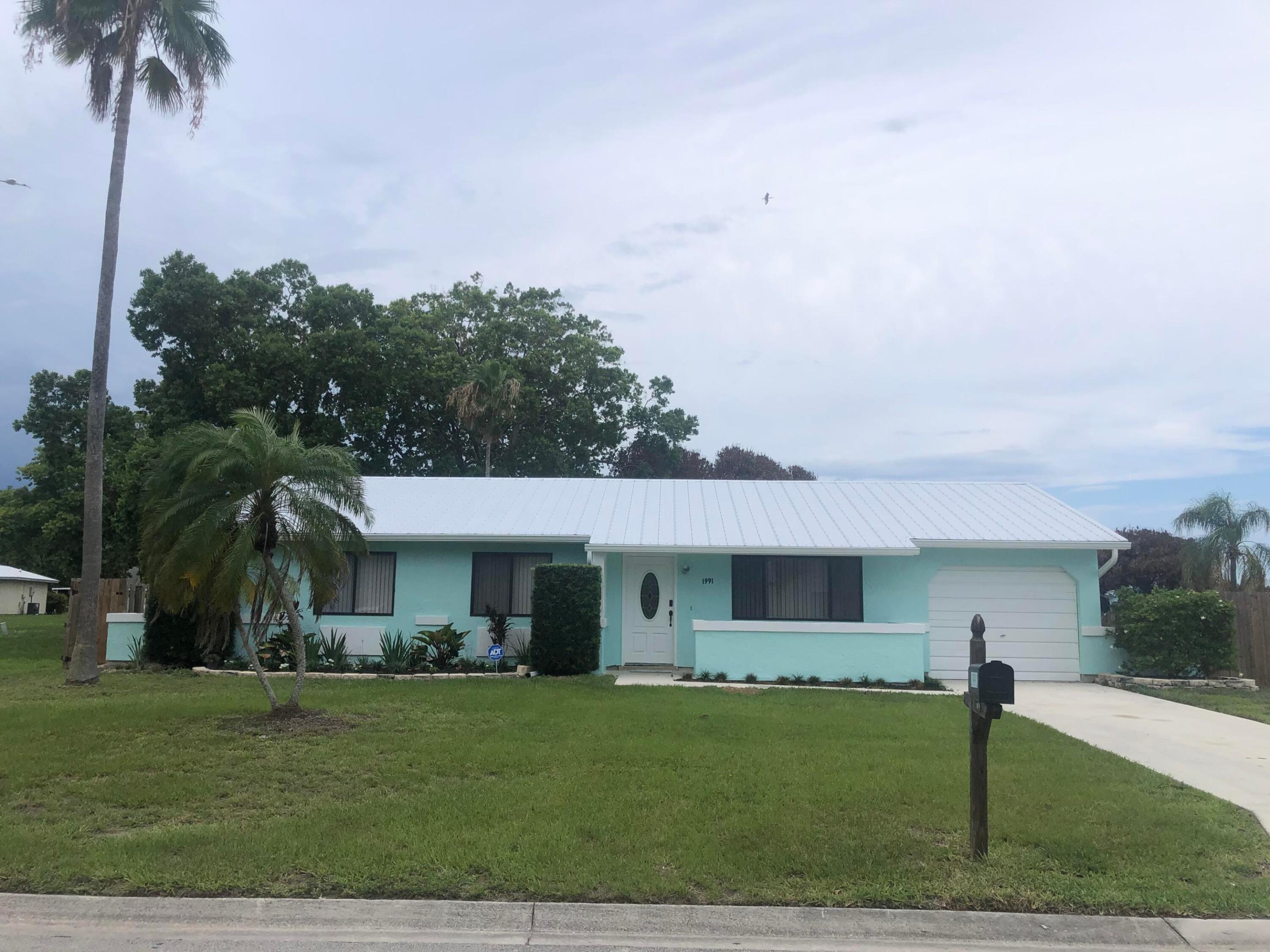 Great location, has new metal roof, new appliances, countertops and tile flooring. The pool refinished all with warranties. AC has 2 year warrantee