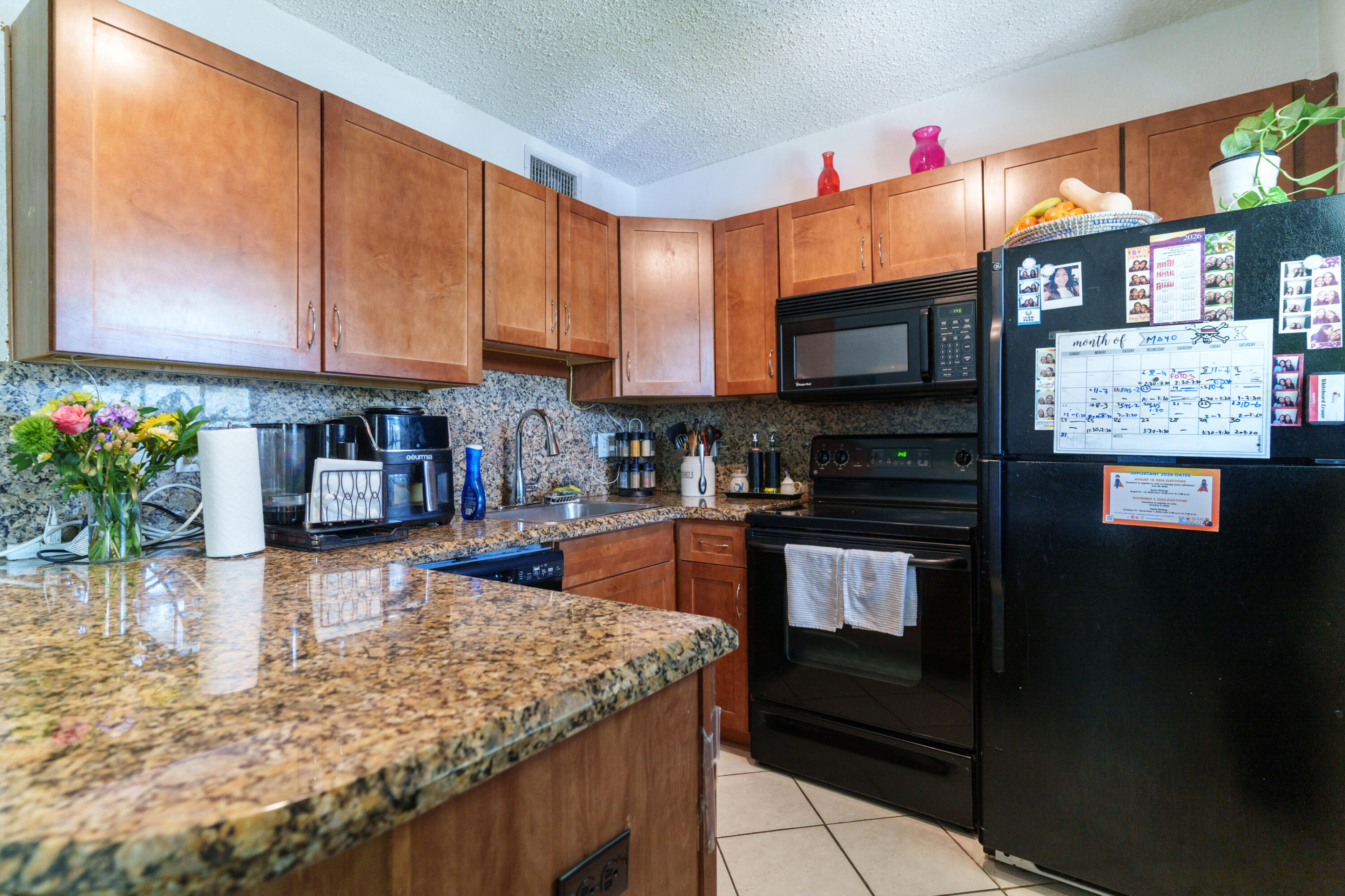 Updated 2BR/1BA condo in The Grove at Wilton Manors featuring impact windows, tile floors, remodeled kitchen and bath with granite countertops and wood cabinets, A/C replaced in 2025 with a 2-ton Trane system, and tasteful modern finishes throughout. First-floor unit in a well-maintained Gated Community with immediate rental eligibility and a pet-friendly community. Excellent location near Wilton Drive dining, entertainment, shopping, beaches, and downtown Fort Lauderdale