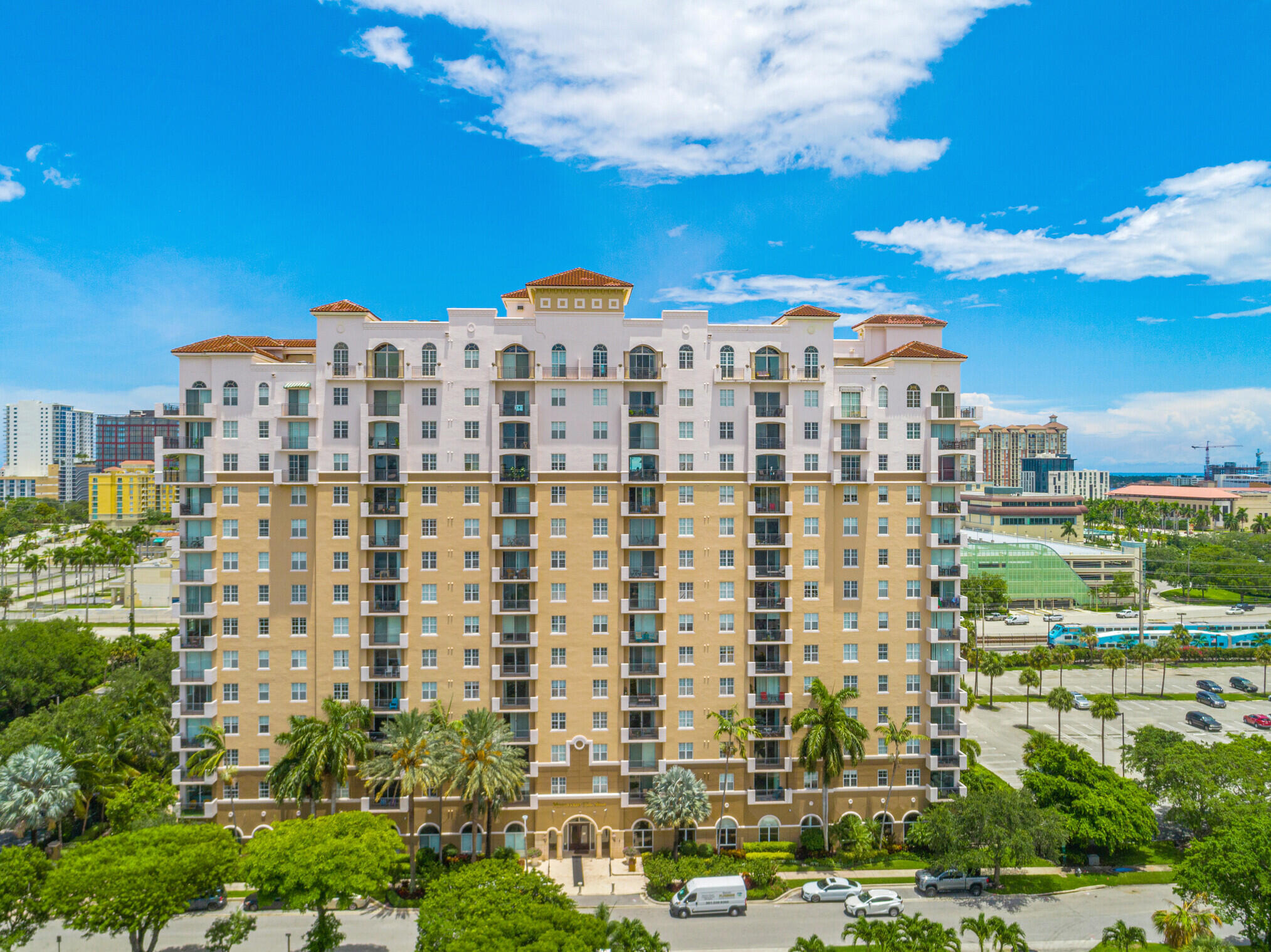 Discover modern living in this stunning condominium at 616 Clearwater Park Rd, West Palm Beach. This spacious unit features an open-concept layout, allowing for plenty of natural light. The well-appointed kitchen boasts sleek countertops and ample storage with Stainless Steel appliances. Enjoy serene views from the private balcony overlooking the pool and downtown. This building has excellent amenities including a fitness center, swimming pool, hot tub and sauna as well as and 24-hour concierge. Conveniently located near shopping, dining, and entertainment options. Experience incredible value and the best of condo living here! Right accross the street from the new Berkeley developments.