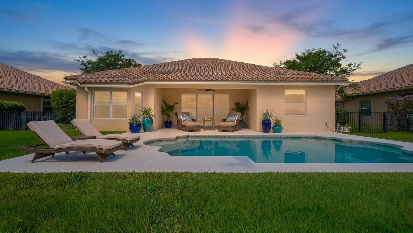 Private pool living in sought-after Fieldstone Ranch! This spacious Vero Beach home offers soaring ceilings, open-concept living, and seamless indoor-outdoor flow designed for the Florida lifestyle. Enjoy a resort-style pool, fully fenced backyard, 3-car garage, and flexible office space ideal for remote work or hobbies. The oversized primary suite features dual vanities, soaking tub, walk-in shower, and large closet. Conveniently located near the Indian River Fairgrounds, less than a mile from Sandridge Golf Club, and minutes to shopping, dining, parks, and beaches.