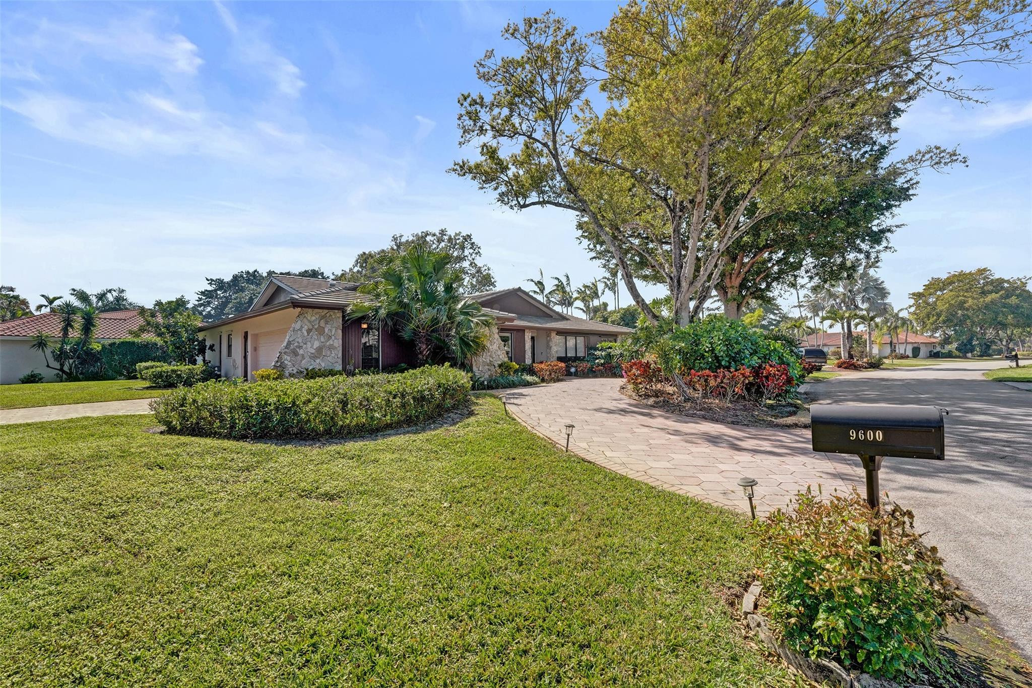 Welcome to Jacaranda Country Club! This four bedroom, 2.5 bath home is a masterpiece of comfort and elegance nestled in the heart of Plantation, updated kitchen and bathrooms, and new roof. Outside, a tropical paradise awaits located on a corner lot. Lounge by the sparkling pool, dine al fresco under the covered patio, or enjoy the lushly landscaped yard that offers both privacy and tranquility. Whether it’s hosting weekend barbecues or quiet evenings under the stars, this backyard is your personal sanctuary. Located minutes from Jacaranda Golf Club, shopping, dining, and easy access to major highways. It’s more than a home—it’s a lifestyle!
