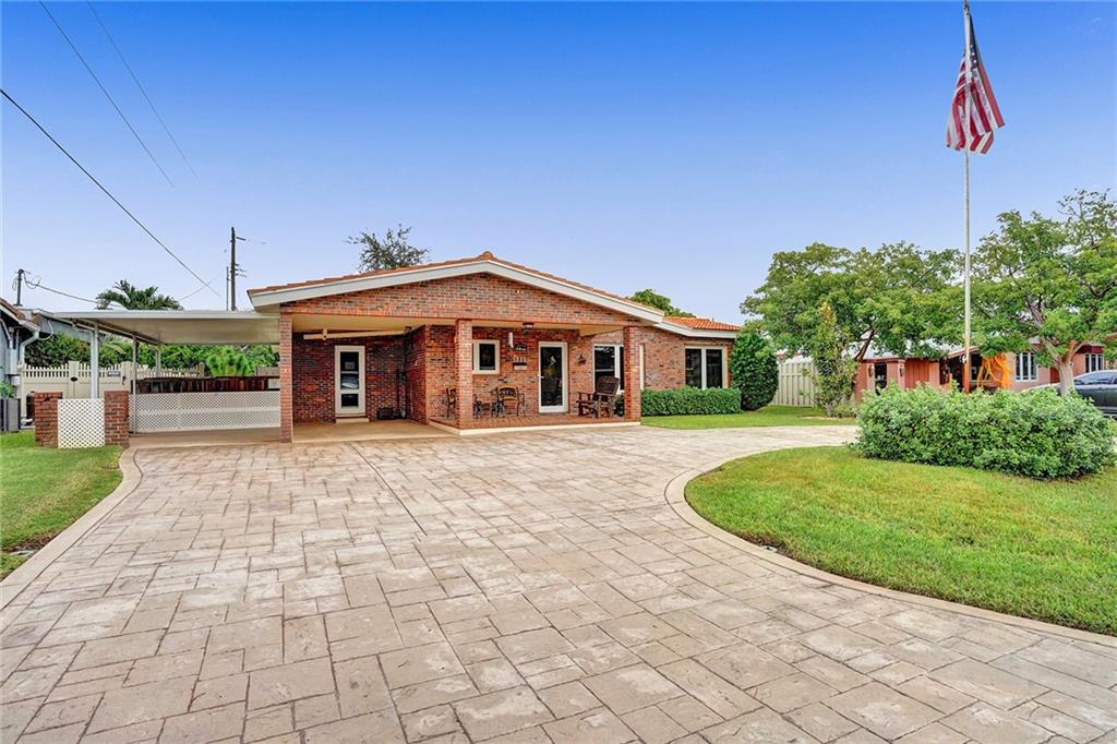 Sought after area of Coral Heights, 3 bedroom, 2 bath, private fenced in back yard offering a clean slate with plenty of room for a nice sized pool. Property boasts impact windows and doors, new roof in 2017, replaced all cast iron pipes under the residence and upgraded electrical panel. This home also offers a beautiful stamped concrete circular drive, as well as a 2 car carport. Lovingly maintained by original owner. Great floorplan with both large living and family room. Not only is there a spacious interior laundry/utility, but also a bonus home office. SHOWINGS WILL BEGIN OCT. 30 AND 31 AT THE OPEN HOUSES, Noon till 3:00   No showings prior to this.