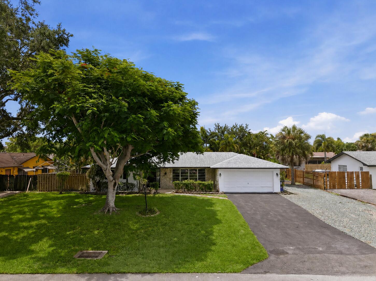 THIS IS A NO HOA COMMUNITY, BOATS, RV'S, AND MOTORCYCLES ARE WELCOME. NO PET RESTRICTIONS. Welcome 31 W Coconut Dr! A 3-bedroom, 2-bathroom home offering 1,503 square feet of living space with a desirable split-bedroom floor plan and a 2-car garage. Big bedrooms and great living space. This home feels huge! Freshly painted inside and out, this move-in-ready home features an updated kitchen, renovated bathrooms, and a functional layout that provides both comfort and privacy. The fully fenced backyard offers plenty of space for pets, play, or outdoor entertainment. Conveniently located near shopping, dining, schools, school bus stops, parks, and major roadways. This home is minutes from everything you could possibly need. Do not miss your opportunity to make it yours! It will not last long.