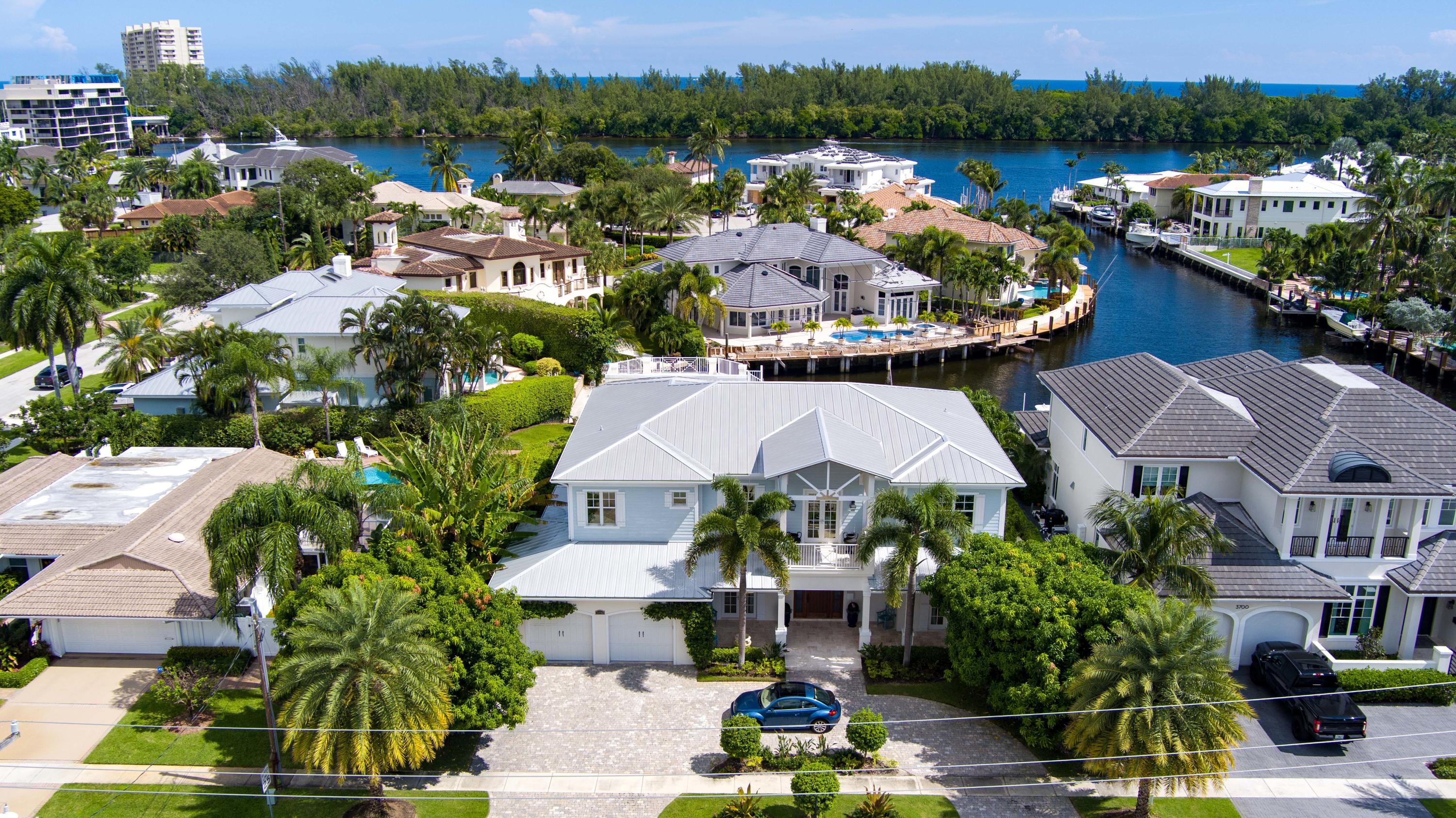 This stunning West Indies-inspired deepwater estate creates a luxurious resort-like realm complete with full-service dockage on 100± feet of basin-like waterfront.  Sweeping water views backdrop the spectacular outdoor entertainment space on the tumbled marble terrace featuring a glass-tiled waterfall pool with LED night lighting, a dining lanai with summer kitchen, and a gas fire table.  Lush palms, fruit trees, flower gardens, and an herb garden grace the manicured grounds. DISCLAIMER: Information published or otherwise provided by the listing company and its representatives including but not limited to prices, measurements, square footages, lot sizes, calculations and statistics are deemed reliable but are not guaranteed and are subject to errors, omissions or changes without notice. All such information should be independently verified by any prospective purchaser or seller. Parties should perform their own due diligence to verify such information prior to a sale or listing. Listing company expressly disclaims any warranty or representation regarding such information. Prices published are either list price, sold price, and/or last asking price. The listing company participates in the Multiple Listing Service and IDX. The properties published as listed and sold are not necessarily exclusive to listing company and may be listed or have sold with other members of the Multiple Listing Service. Transactions where listing company represented both buyers and sellers are calculated as two sales. The listing company's marketplace is all of the following: Vero Beach, Town of Orchid, Indian River Shores, Town of Palm Beach, West Palm Beach, Manalapan Beach, Point Manalapan, Hypoluxo Island, Ocean Ridge, Gulf Stream, Delray Beach, Highland Beach, Boca Raton, East Deerfield Beach, Hillsboro Beach, Hillsboro Shores, East Pompano Beach, Lighthouse Point, Sea Ranch Lakes and Fort Lauderdale. Cooperating brokers are advised that in the event of a Buyer default, no commission will be paid to a cooperating Broker on the Deposits retained by the Seller. No commissions are paid to any cooperating broker until title passes or upon actual commencement of a lease. Some affiliations may not be applicable to certain geographic areas. If your property is currently listed with another broker, please disregard any solicitation for services. Copyright 2021 by the listing company. All Rights Reserved.