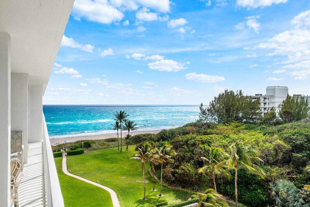 Experience coastal living at its finest in this beautifully designed 2-bedroom, 2-bathroom residence featuring stunning ocean views. Floor-to-ceiling impact sliders create a seamless connection between indoor living and the spectacular waterfront setting. The thoughtfully designed open-concept kitchen is a standout feature, crafted by renowned Italian maker Snaidero. Clean lines, premium finishes, and generous workspace make it perfect for both everyday living and elegant entertaining. Thassos marble flooring, two tankless water heaters and an Miele Washer/dryer. With its elevated vantage point, modern layout, and designer kitchen, this residence delivers the ideal blend of style, comfort, and  waterfront Florida coastal living.