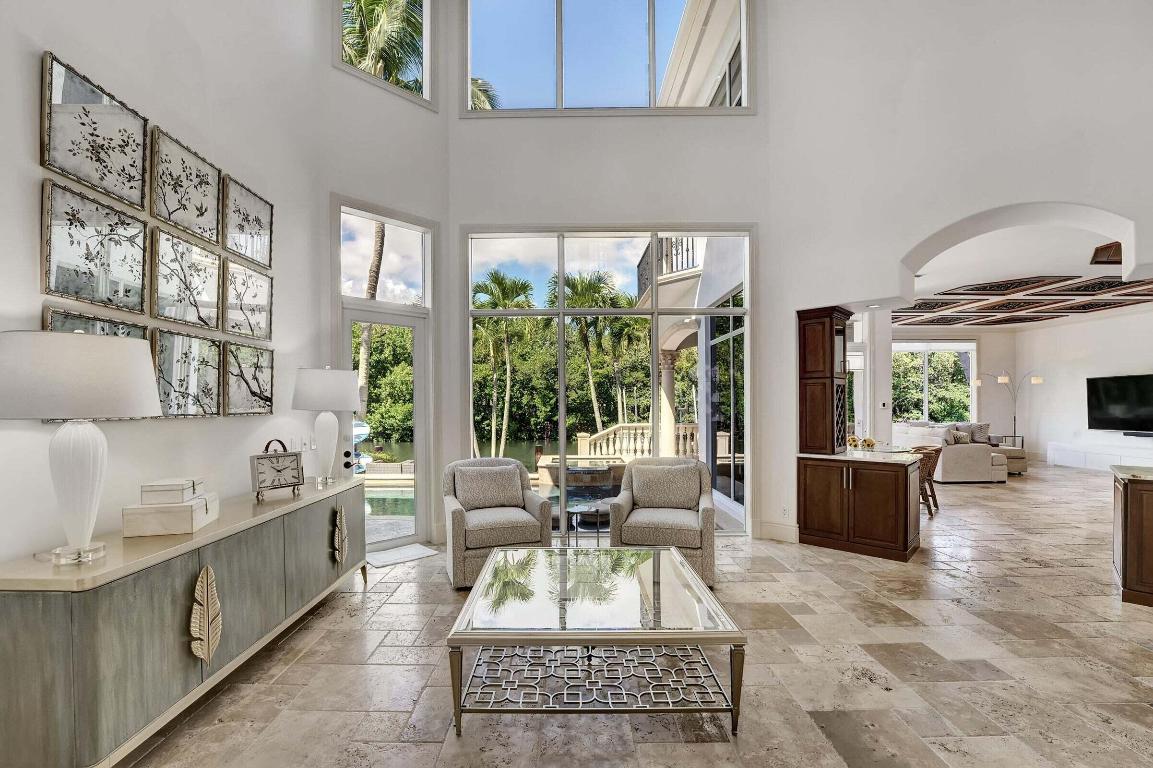 Masterfully designed with family in mind this impeccably maintained 4 bedroom, 4 full bath, 1 half bath home exudes calm and comfort. Located In the prestigious and sought after guard-gated community of Harbour Isles. A waterfront community with deep water, ocean access, minutes to 2 inlets, with a 24-hour manned gate. The 90' canal frontage can accommodate up to a 70 foot vessel, or multiple boats with lift. Encompassing 4756 sf of luxurious living featuring the gourmet chef's inspired kitchen with gracious entertaining spaces flowing effortlessly to the resort style pool and spa. Situated on a pristine location on deep water this healthy haven provides privacy and multiple outdoor spaces to enjoy your fitness and wellness routines on the covered loggia.  Continue your wellness routines upstairs in the home gym. While the dedicated workspace in the private office is sure to inspire productivity. Wake up each day to the south Florida splendors! The home enjoys fully automated systems for security, irrigation, lighting, music, pool and spa.  The home also features a summer kitchen, Ipe Brazilian hardwood dock, custom landscape lighting and pool lighting. 

A very private and peaceful setting that is also close to all highways, shopping, new hip restaurants, golf and country clubs, and some of the best beaches in Palm Beach County.