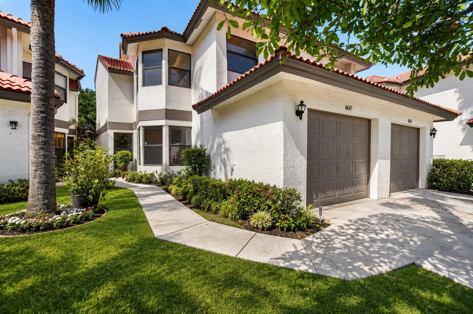 Welcome to 6647 Boca Hermosa Lane! Just renovated and move-in ready, this stunning home has been thoughtfully renovated from top to bottom with a brand-new designer kitchen, beautifully updated bathrooms, gorgeous light oak-look luxury vinyl flooring throughout, modern recessed lighting, and all new appliances. Every detail has been carefully selected to create a bright, elegant, and welcoming living space you will instantly fall in love with. Enjoy a spacious screened-in patio overlooking a lovely private backyard — perfect for relaxing, entertaining, or enjoying Florida living year-round.The home features 3 generously sized bedrooms, each one with walk-in closet, and 2.5 beautifully updated bathrooms, offering both comfort and functionality for everyday living.  Canary Pointe is a quiet, well-maintained boutique community ideally located close to everything Boca Raton has to offer — fine dining, shopping, parks, golf, major highways, and just minutes from Mizner Park and Town Center Mall. The community is also located within Boca Raton's highly rated school district, one of the area's most sought-after locations for families and homeowners alike. Beautiful, stylish, and completely turnkey — this is the home you have been waiting for. Come see it today and fall in love!