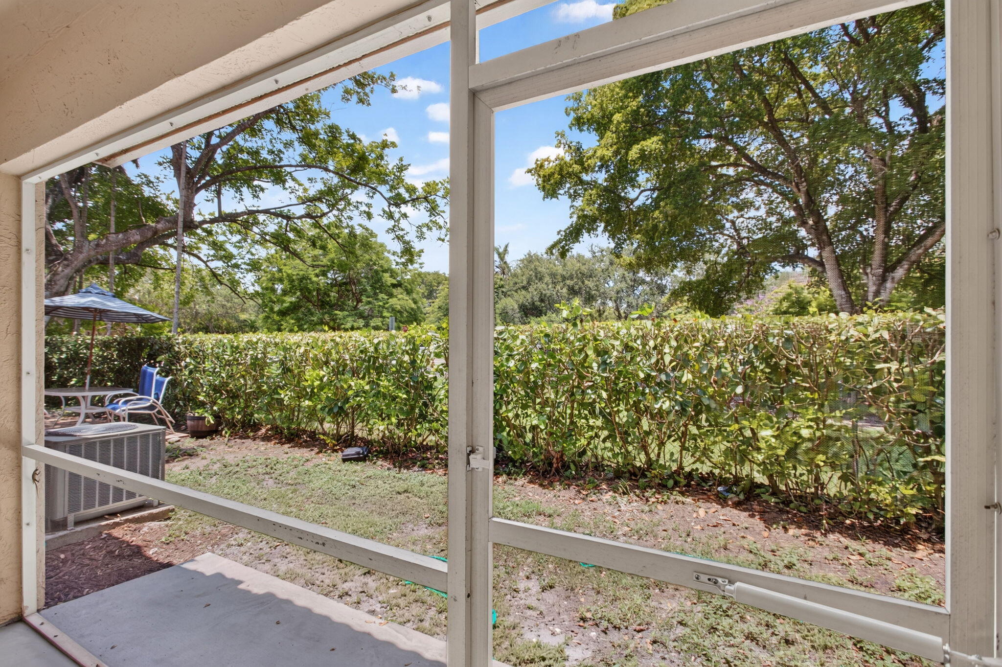Welcome to Portofino Condominium in the heart of Coral Springs! This spacious 3-bedroom, 2.5-bath townhome offers a desirable layout with the primary suite conveniently located on the first floor. The updated kitchen features white shaker cabinets, stainless steel appliances, and ample storage, while wood laminate flooring runs throughout the home for a clean, modern feel. The two upstairs guest bedrooms share a convenient Jack-and-Jill bathroom, making the layout ideal for family or guests. Soaring volume ceilings in the living room fill the home with abundant natural light, creating an open and inviting atmosphere. Complete with a one-car garage and located close to shopping, dining, parks, and major roadways, this move-in ready home is a fantastic opportunity. Schedule your private tour