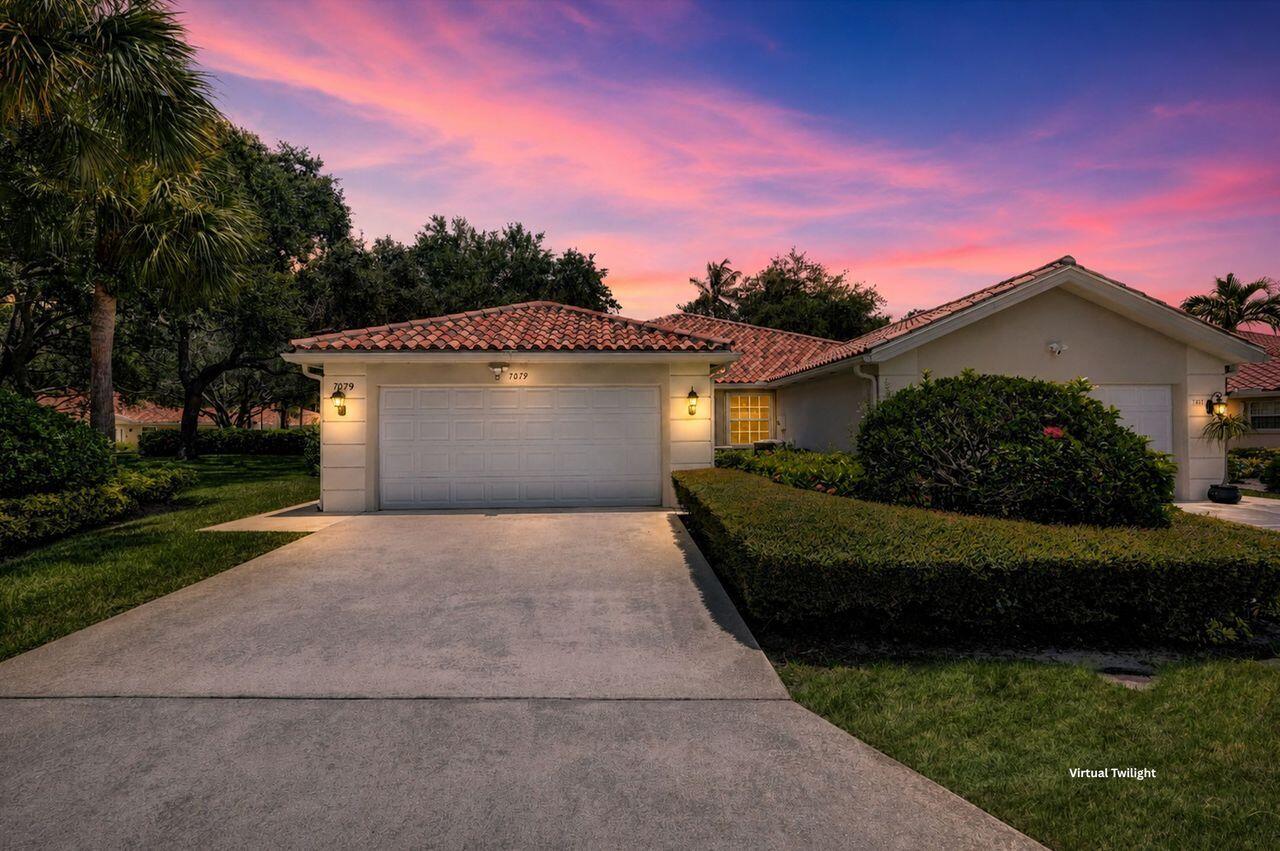 Welcome to this beautifully positioned 2-bedroom, 2-bath "Capri" model offered fully furnished in the sought-after gated community of RiverWalk. Situated on a spacious corner lot, this residence features a desirable split-bedroom floor plan, soaring vaulted ceilings, a screened patio with peaceful garden views, a two-car garage, and a dedicated laundry room.   RiverWalk offers resort-style living without mandatory country club fees, featuring three heated pools, a fitness center, Har-Tru tennis courts, over 12 miles of scenic walking trails, and a vibrant Town Center with a café, general store, beauty salon, post office, clubhouse, and a full calendar of social activities. Conveniently located near shopping, dining, major highways, and Palm Beach International Airport.