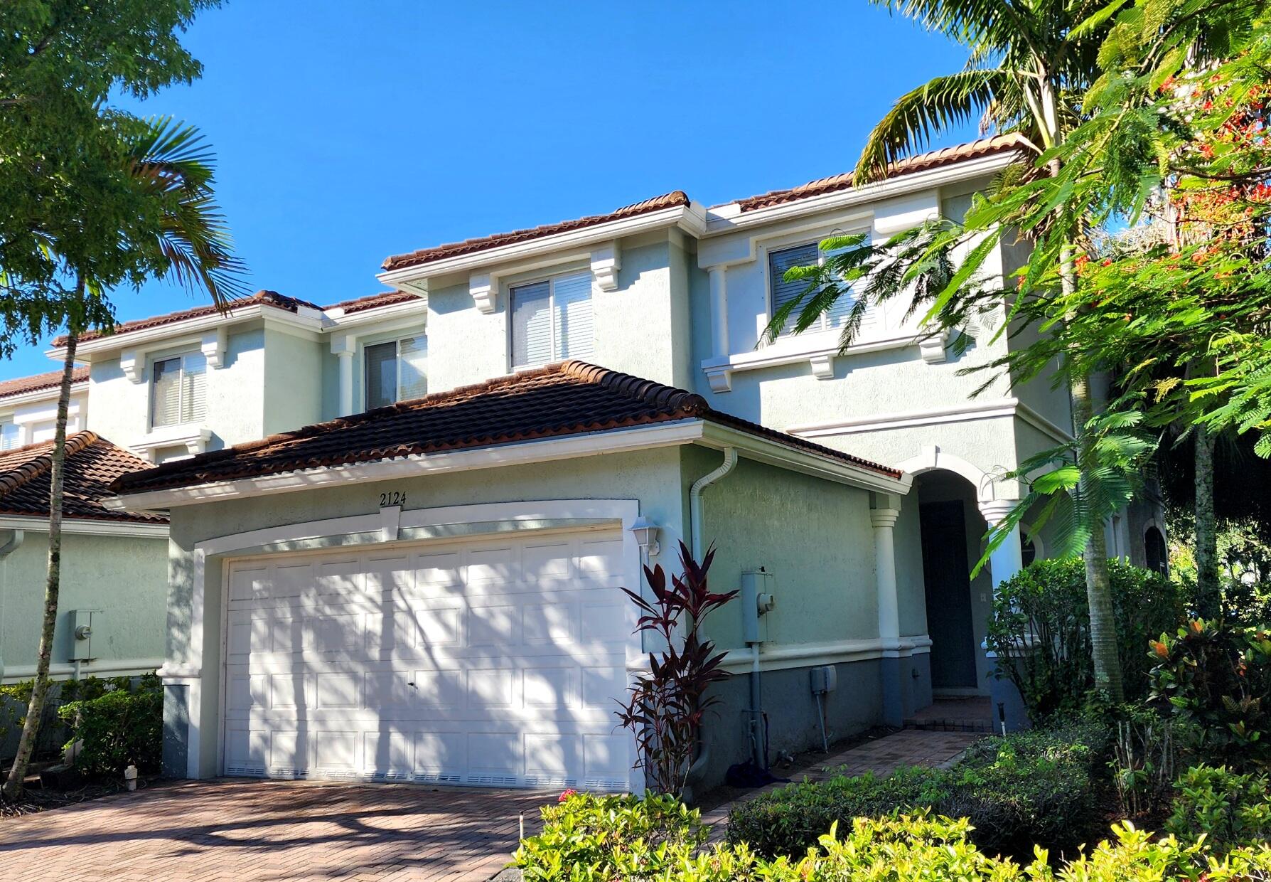 Newly renovated and freshly painted, this corner unit- spacious townhouse provides nice privacy and quietness and is just a few steps away from the lighted tennis court and clubhouse with pool. All the stainless steel kitchen appliances are brand new. The unit also offers a screened back patio with an extra storage space and a two car garage. This gated community has the most convenient location in town!