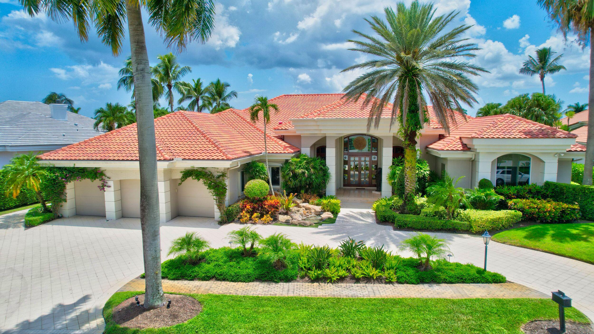 Magnificent one-story home with lake & golf course views, located on an OVERSIZED, HALF-ACRE LOT in the Lake Estates section of St. Andrews CC. Open, split-bedroom floor plan with four bedrooms + office. The interior is light and bright, with soaring volume ceilings and floor-to-ceiling windows throughout. The kitchen, which opens to the family room and breakfast area, has 2 sinks, double ovens and walk-in pantry. Oversized master suite has spacious walk-in closets, 2 showers, 2 W/Cs, and 2 sinks. All guest bedrooms are ensuite. Southern exposure in the backyard, with large open, covered and screened patio areas, pool with spa, summer kitchen, and lake & golf course views.