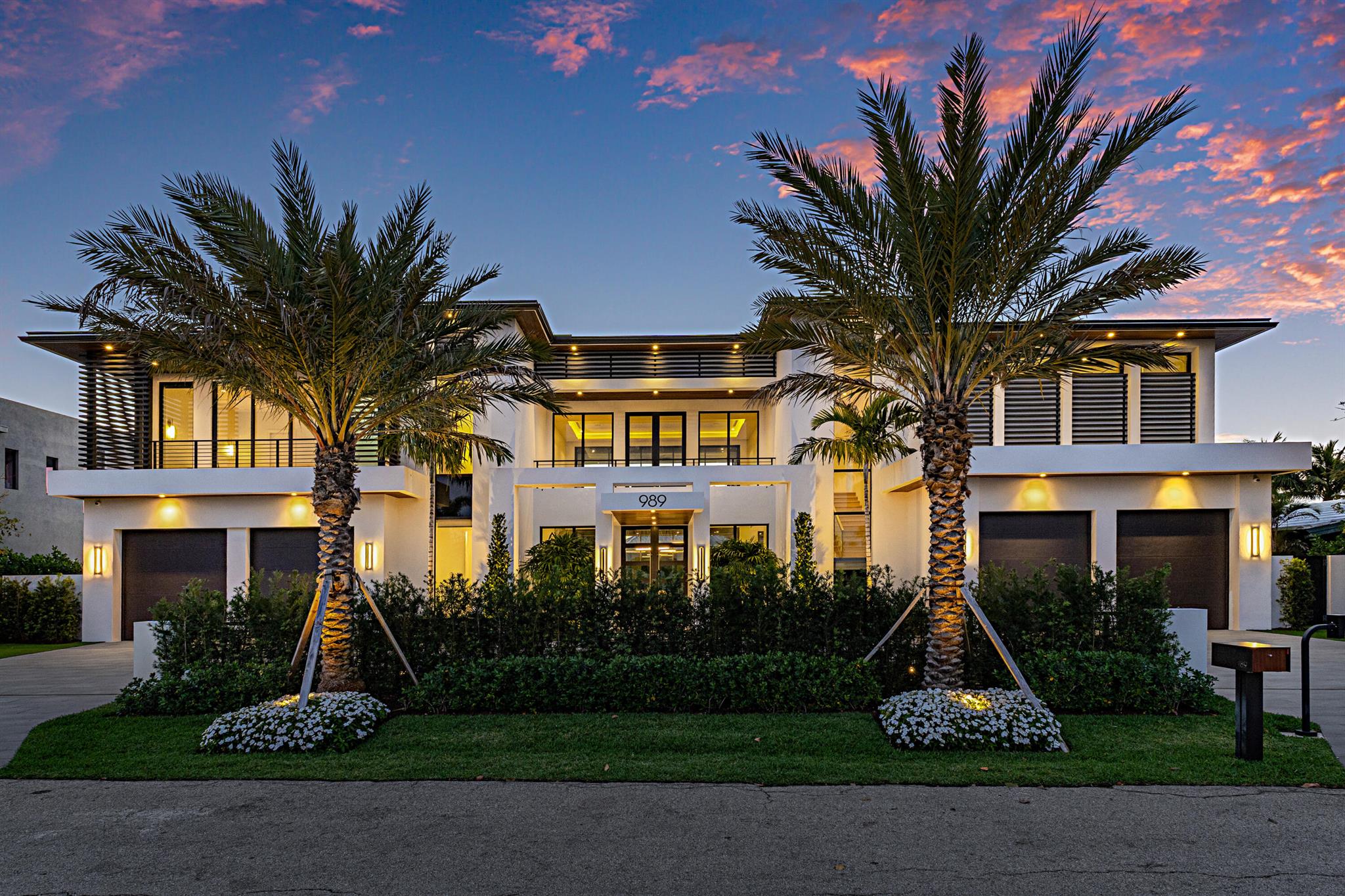 Welcome to The Marble Palm Estate, a British West Indies-inspired masterpiece, just steps from the beach. Nestled on 119 feet of deep-water frontage, this newly constructed estate offers 5 bedrooms, 5.2 baths, and an exquisite blend of sophisticated design and cutting-edge technology.

Upon entry, you are greeted by a lovely living room featuring stunning Azure Blue Quartzite slabs around the gas fireplace and TV, adding a touch of natural beauty and elegance to the space. The open concept seamlessly flows into the gourmet chef's kitchen, which is framed by a beautiful Cypress wood ceiling, creating a warm and inviting atmosphere. The kitchen features bar seating for 5/6, offering an ideal spot for casual dining or entertaining. Outfitted with top-tier Wolf & Sub-Zero appliances, it is designed for culinary excellence. A magnificent clubroom serves as the heart of the home, seamlessly integrated with a waterfront office, creating the perfect balance of work and leisure. A floor-to-ceiling glass wall provides soundproofing while allowing natural light to flood the space, offering uninterrupted water views in both rooms. The clubroom also features a spacious walk-in wine room, making it an ideal setting for entertaining in style.

Upstairs, the expansive primary suite is a true retreat, featuring a private seating area, perfect for unwinding with a book or enjoying late-night TV in total comfort. The suite boasts sweeping water views, providing a tranquil backdrop. The spectacular primary bathroom offers an unparalleled experience, with privacy fog doors for the two toilet rooms and an oversized shower room, perfect for relaxation and rejuvenation. The suite is accompanied by a boutique-style closet, featuring a massive closet island with 20 pull-out drawers and two seating benches, offering ample storage and a luxurious, organized space.

The second floor also offers 4 additional suites, each accompanied by its own private bathroom, providing ultimate comfort and privacy for family members or guests.

Designed for seamless indoor-outdoor living, the estate boasts a resort-style backyard that is perfect for entertaining and relaxation. The 45-foot pool and spa are the centerpiece of this outdoor oasis, surrounded by lush landscaping and turfed grass that provides a perfect balance of beauty and functionality. The entire space is illuminated in the evening, creating a serene and inviting atmosphere for enjoying Florida's sunsets and warm nights. The estate also features an impressive 1,356 sq. ft. covered patio on the first floor, creating a resort-style ambiance ideal for entertaining. An additional 1,100 sq. ft. of outdoor space on the second-story loggia offers a private, elevated retreat with spectacular water views. The fully equipped summer kitchen enhances the outdoor experience, making al fresco dining effortless. A state-of-the-art smart home system and private digital security gate ensure convenience, privacy, and peace of mind. Additional features include a spacious four-car garage and a whole-home generator, providing uninterrupted power and ultimate peace of mind.

Nestled within Sun and Surfone of Boca Raton's premier waterfront communitiesthis estate is a dream for boating enthusiasts, offering direct access to the Intracoastal with no fixed bridges. Within minutes of the inlet leading to the Atlantic Ocean, this location is perfect for those seeking a true yachting lifestyle. Ideally positioned between the Intracoastal and the Atlantic Ocean, The Marble Palm Estate is also directly across from the iconic Red Reef Park, home to a scenic Par-3 golf course. Best of all, it's within walking distance to the beach, offering an unmatched blend of coastal serenity and luxury.

Designed by Brenner Architects and crafted by National Custom Homes, The Marble Palm Estate is the pinnacle of coastal luxury.