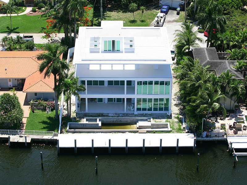 DRASTIC PRICE REDUCTION. NEARLY COMPLETE. MODERN DESIGN BY PORTUNDO PEROTTI ARCHITECTS. INTRACOASTAL VIEWS. FITS 70 FT YACHT. 10 FT IMPACT GLASS SLIDERS. ELEVATOR TO THREE LEVELS. PORCELAIN FLOORS. WENGE WOOD MILLWORK. VANTAGE AUTOMATED LIGHTING. 60 FT LA P POOL. 400 BOTTLE SEE THROUGH GLASS WINE ROOM. WOLF 48" GAS RANGE. 70" FLATSCREEN TV. UPSTAIRS LOUNGE & GYM. MASTER BATH HAS 2 WATER CLOSETS, STEAM SHOWER & SOAKER TUB WITH ONYX BACK WALL. 3RD LEVEL GAME ROOM & FULL BATH. CONCRETE DOCK.
