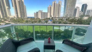***Elegant, Bright,  and Cozy unit with direct East views facing Heritage Park and Ocean! Upgraded with porcelain tile flooring throughout. Bright and open kitchen with recessed lighting, granite countertops and backsplash. Tiled bathroom walls, granite countertop vanity, with glass sliding shower doors. New Bedroom Hurricane Proof windows.  Ample walk in closet space. ***All assessments have been paid in full! Located directly across the street to Beach, and mins away to houses of worship, supermarkets, banks, restaurants, Aventura Mall, Etc. Building has 24 hour security, front desk, valet, pool, gym, tennis courts, billiard, hair salon, Coffee Shop, and mini mart. A true Prime Location-Can't beat this! ***Currently rented to wonderful annual tenants!