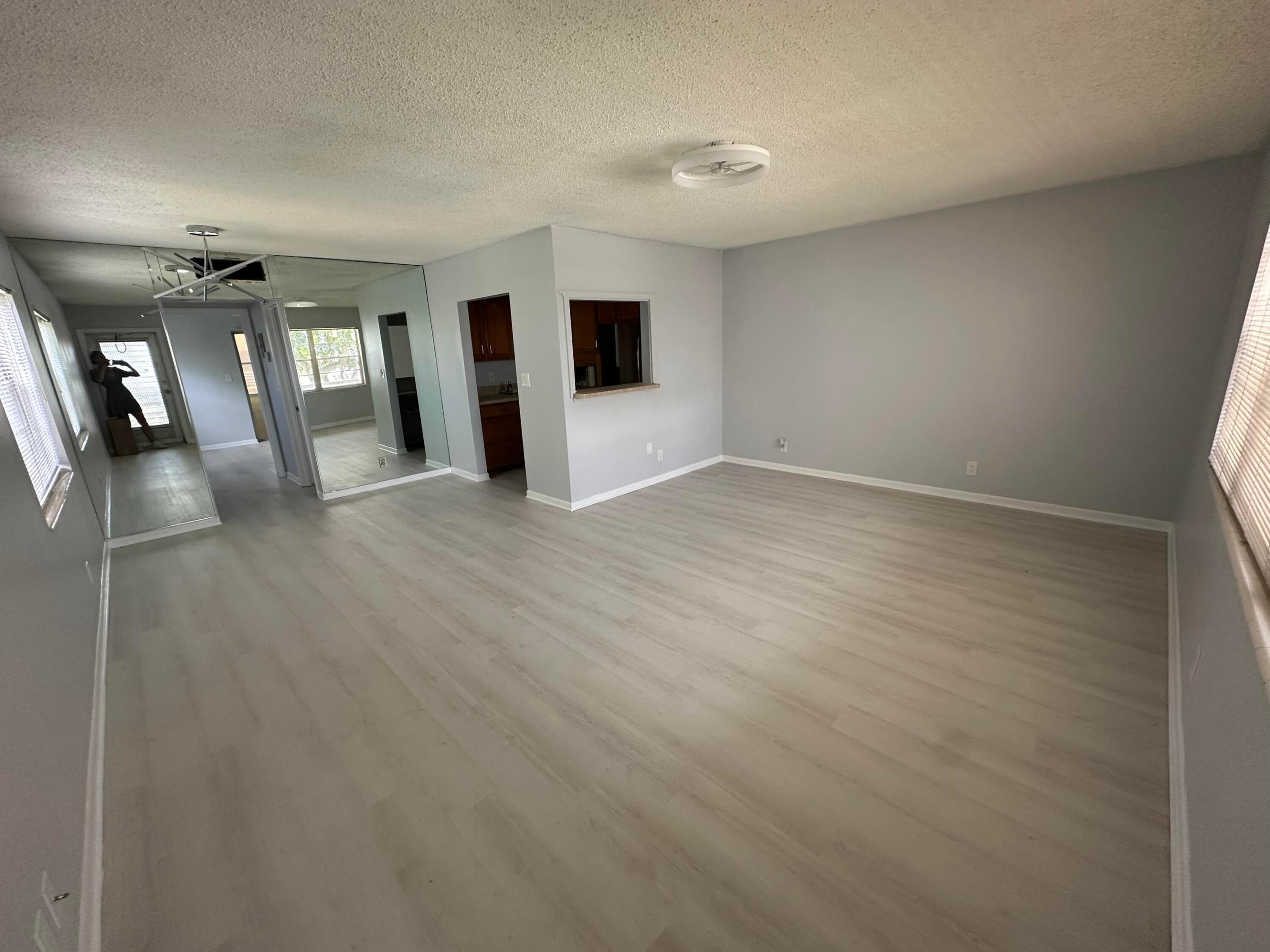 Rentable from day 1. Beautiful and bright corner unit renovated overlooking the garden steps away from the clubhouse right across The Haverill gate. The unit was completely updated and features an instant water heater, 2 years old AC unit, new appliances, 2 separate walk in closet, garden view... The unit is ideally located: walking distance to the Club house. Enjoy all the amenities Century Village (+55 community) as to offer: indoor pool, fitness center, free shuttle, outdoor pool, social events...