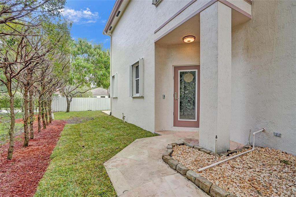 Available July 2026. NOT SHOWING YET  Beautiful and spacious two-story single-family home in the highly desirable Lakes of Newport community.   One of the home's standout features is its exceptional location within the community. The backyard borders a charming neighborhood park, creating the feeling of having your own private green space just beyond your property line. The community pool is only steps away—so close that it feels like an extension of your backyard. Grab a towel, bring a snack, and enjoy resort-style convenience without the maintenance.  This well-maintained residence features 4 bedrooms, 2 full bathrooms, 1 half bathroom, and a 2-car garage, with hurricane protection throughout for added peace of mind.  Enjoy a prime central Plantation location