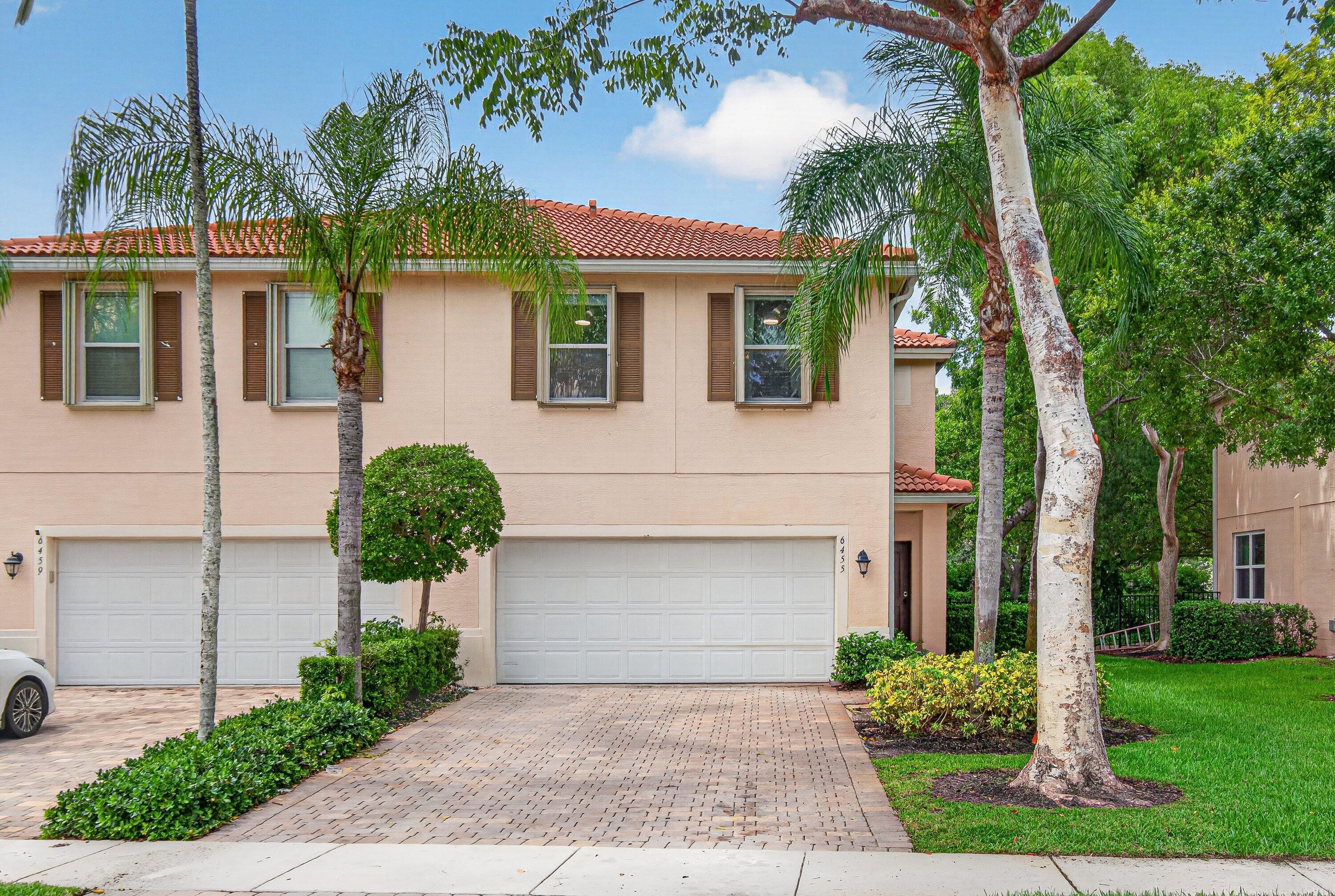 Beautiful end unit townhome in a fantastic location! This move-in-ready home has been completely updated and is ready for its new owner. Recent improvements include  A/C system, water heater, fence and impact-rated sliding glass door. The kitchen has been beautifully upgraded with quartz countertops and backsplash, and the refrigerator and dishwasher are 2 years old. The first floor features stunning 24" x 48" porcelain tile flooring, while the staircase and entire second floor showcase attractive wood-look laminate flooring. New washer and dryer add additional convenience. The primary suite offers a fully customized walk-in closet with built-in storage and an upgraded primary bathroom. Accordion shutters protect all upper-level windows, providing both convenience and peace