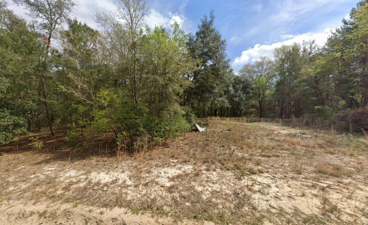 Zoned R-2 - Owner Financing Available - Multi-Lot Packages Offered! Discover your opportunity to own land in beautiful Interlachen Lakes Estates! This vacant lot offers R-2 zoning, allowing for site-built, manufactured, modular, mobile, tiny homes, and barndominiums—giving you full flexibility to build or invest. Owner financing is considered, and the seller owns multiple vacant lots throughout Putnam County, making bundle deals available for buyers and investors. Nestled in a quiet, wooded area near lakes, schools, and shopping, this parcel offers privacy with everyday convenience. Outdoor recreation like boating, fishing, and kayaking is just minutes away. Affordable and full of potential—don't miss your chance to invest in this growing community! Buyer to verify all property details including zoning, utilities, land use, and building requirements. All information deemed reliable but not guaranteed.