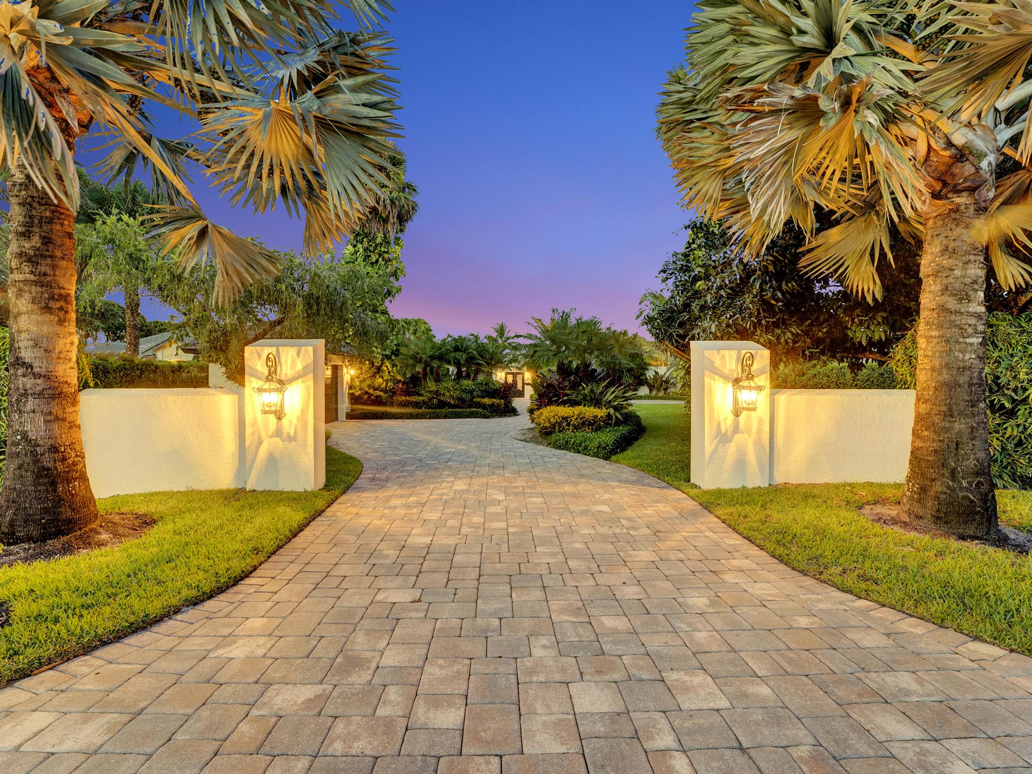 EXQUISITE RIVERFRONT PROPERTY!
This estate was reimagined with a nod to Spanish Colonial architecture and design.  A refreshing collection of intricacies in detail and quality of construction, this courtyard pool home is unlike any other on the market.  

Situated on .8 of an acre and 108' of riverfront on the Loxahatchee River, this home exudes charm and sophistication.  Surrounded by lush foliage, your long driveway takes you directly to the home's impressive double door entry into the courtyard pool adjacent to your three car garage.  Gorgeous Mexican tile and archways line the enclosed vast pool area offering a sense of privacy and tranquility.  With 4,400 sq ft of living space, this home's living room serves as the hub of the property and is the idyllic entertaining space. The open concept kitchen and living area overlook long river views of the Loxahatchee River and across your backyard equipped with a 900 sq ft Tiki Hut and bar area.  
The recently renovated guest bedroom and guest bath share the South wing of the home while the remaining other two guest bedrooms are positioned alongside the courtyard pool.  

EXCEPTIONAL UPDATES + MECHANICALS:  Live your dream Jupiter lifestyle in a home that has made zero compromises for safety and security: a Brand New (highest quality) slate roof, newly installed Impact Windows + Doors on every opening, a full home generator powered by your 1,000 gallon buried propane tank, a tankless hot water system and newer HVAC units comprise of just a few of the recent upgrades to this property.
Jupiter River Estates residents enjoy the finest of Florida waterfront living without any HOA fees or memberships.  Close to the areas best beaches, shopping, dining + sport venues.  Truly a fabulous place to live!