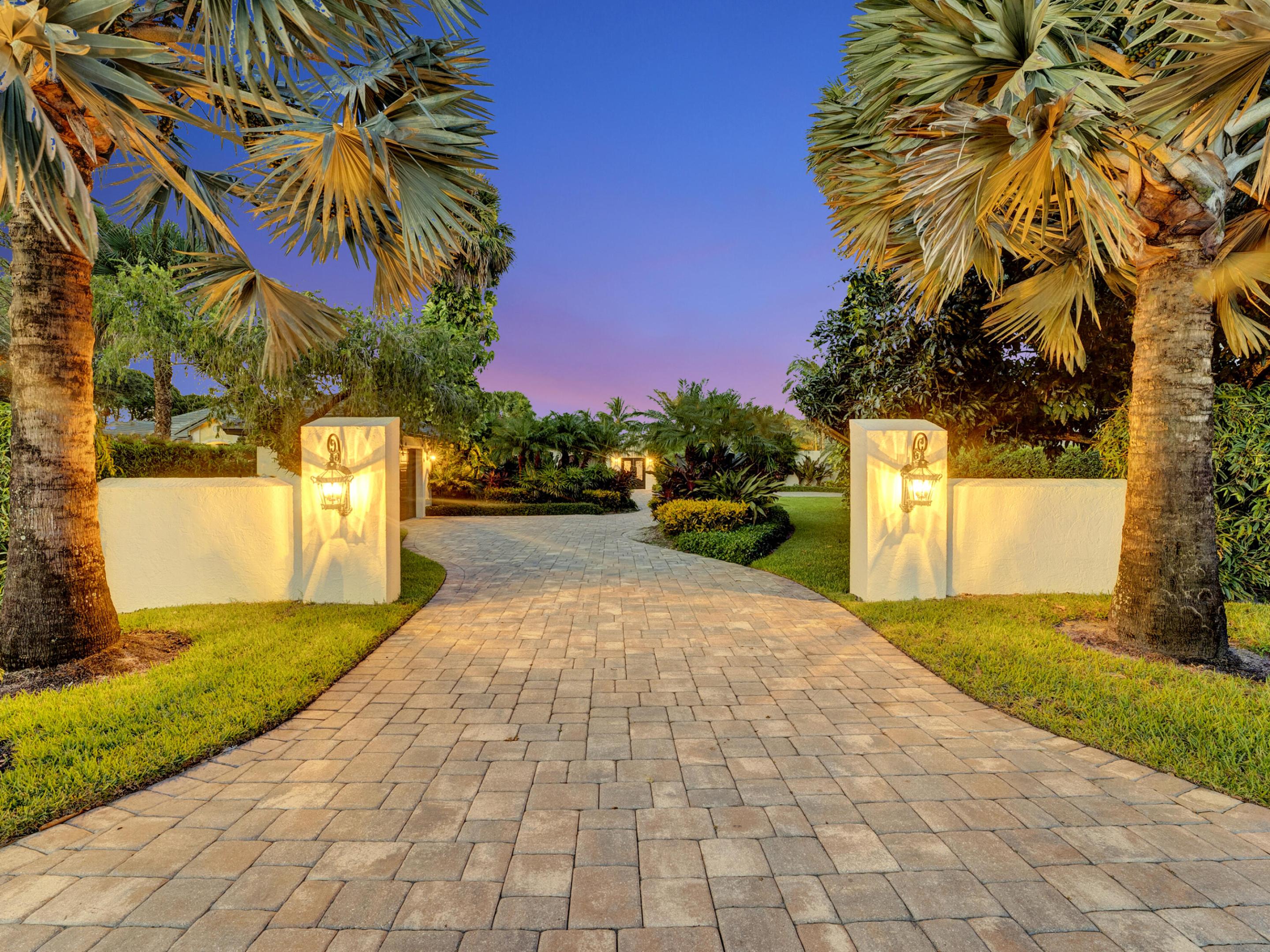 EXQUISITE RIVERFRONT PROPERTY!
This estate was reimagined with a nod to Spanish Colonial architecture and design.  A refreshing collection of intricacies in detail and quality of construction, this courtyard pool home is unlike any other on the market.  

Situated on .8 of an acre and 108' of riverfront on the Loxahatchee River, this home exudes charm and sophistication.  Surrounded by lush foliage, your long driveway takes you directly to the home's impressive double door entry into the courtyard pool adjacent to your three car garage.  Gorgeous Mexican tile and archways line the enclosed vast pool area offering a sense of privacy and tranquility.  With 4,400 sq ft of living space, this home's living room serves as the hub of the property and is the idyllic entertaining space. The open concept kitchen and living area overlook long river views of the Loxahatchee River and across your backyard equipped with a 900 sq ft Tiki Hut and bar area.  
The recently renovated guest bedroom and guest bath share the South wing of the home while the remaining other two guest bedrooms are positioned alongside the courtyard pool.  

EXCEPTIONAL UPDATES + MECHANICALS:  Live your dream Jupiter lifestyle in a home that has made zero compromises for safety and security: a Brand New (highest quality) slate roof, newly installed Impact Windows + Doors on every opening, a full home generator powered by your 1,000 gallon buried propane tank, a tankless hot water system and newer HVAC units comprise of just a few of the recent upgrades to this property.
Jupiter River Estates residents enjoy the finest of Florida waterfront living without any HOA fees or memberships.  Close to the areas best beaches, shopping, dining + sport venues.  Truly a fabulous place to live!