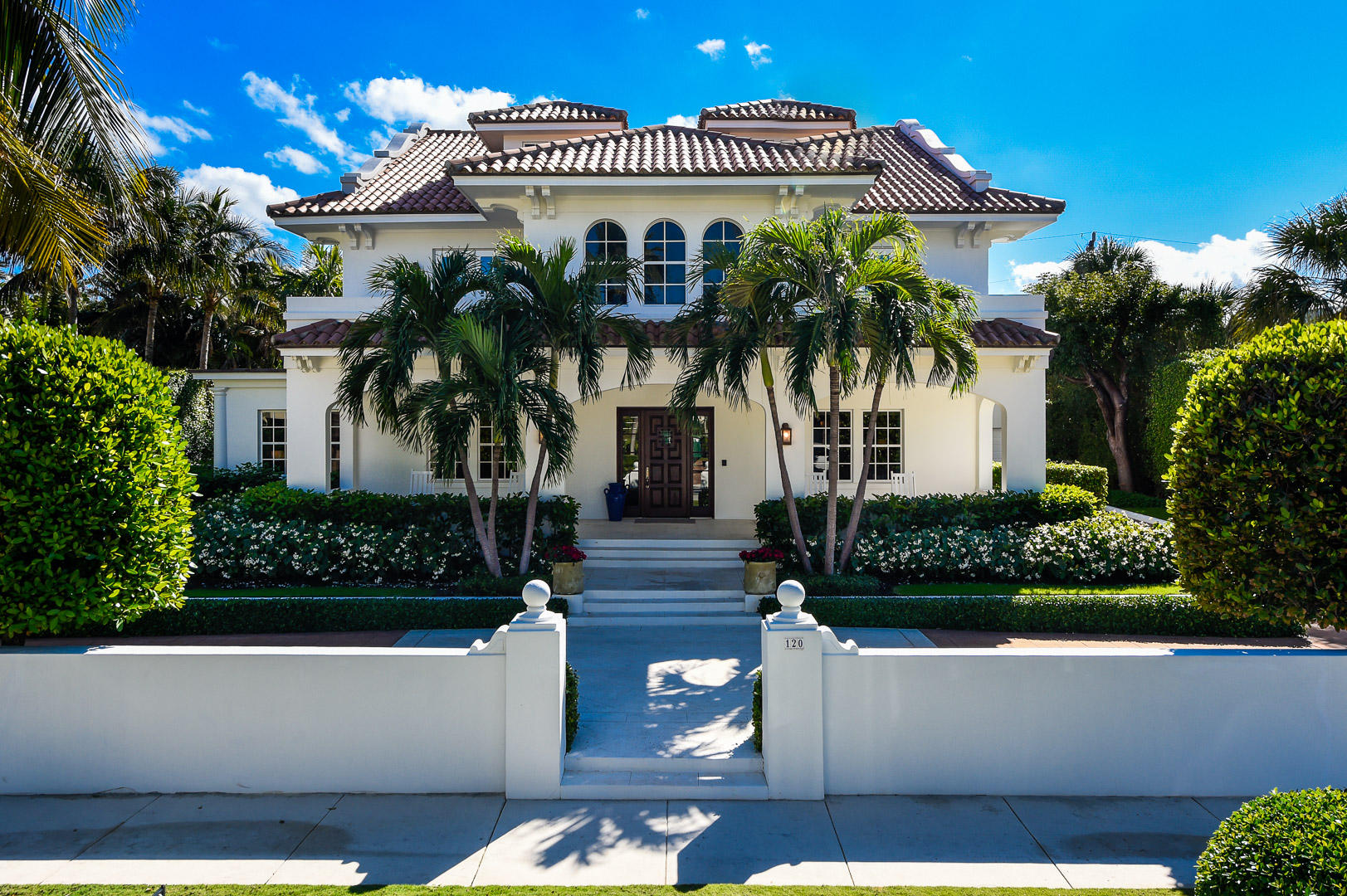 Phenomenal ocean block 5BR/5.3BA home with 1BR/1BA guest house. Ocean views from master balcony. Stunning home perfect for entertaining with oversized reception area, living room, pub room, formal dining, and library. Elevator, breakfast room, 2 car garage, and basement with wine cellar. Gorgeous outdoor living including loggias, summer kitchen, front porch, three balconies, and pool.
