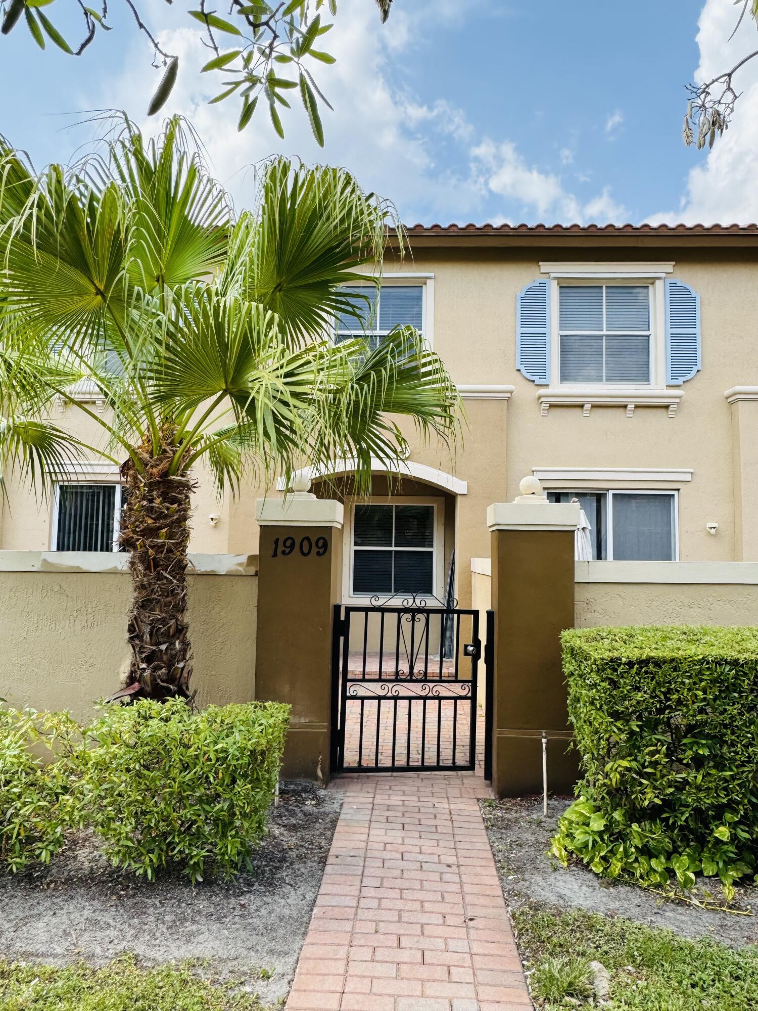 Well maintained 2 Bedroom 2.5 Bath townhouse is located in a gated community with a pool and playground. Low maintenance fee! Can be rented right away! 2 patios and assigned parking. Laminate floor in the living area. Close to the Turnpike, major shopping centers, restaurants, and just minutes to downtown WPB. Don't wait this property won't last! Roof assessment has been paid. Please submit POF or lender approval. 600 credit score required by HOA. All information and sizes are approximant and should be verified by the buyer. Tenant occupied until July 31st rent is currently 2,050.00 F/L/S.