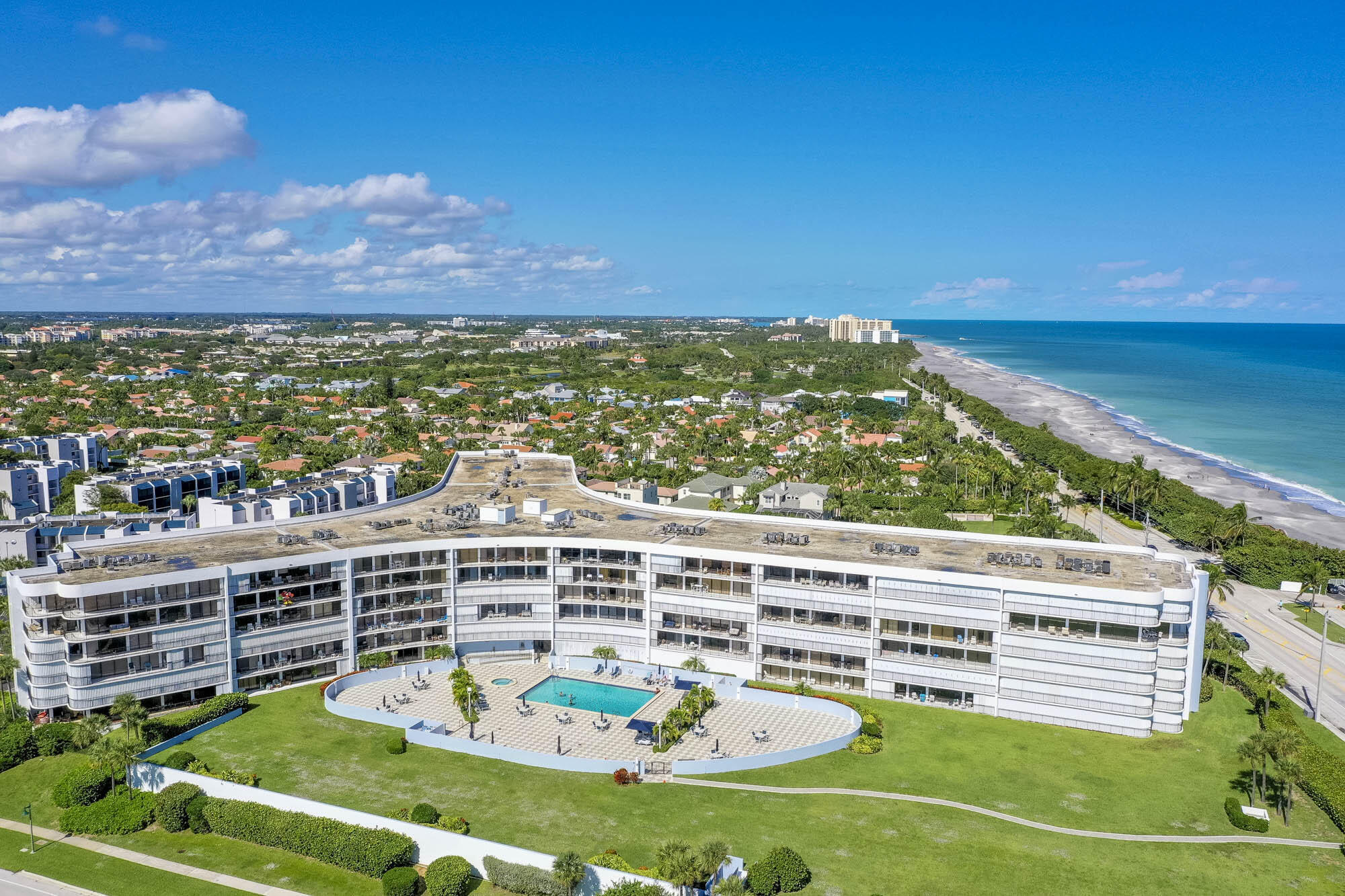 Location, Location, Location! Enjoy coastal living in this bright & spacious 2 BR 2 BA condo located directly across the street from Jupiter Beach. Offering over 1,300 SF of living space, this beautifully maintained residence features quartz kitchen countertops, partial new flooring, electric blinds, walk-in closets, laundry room, garage parking, add'l storage & an expansive covered balcony w/ stunning sunset views. Oceancrest is a full-service luxury building w/ resort-style amenities including a HUGE sparkling heated pool, spa, bike/kayak storage, elegant lobby & hallways, concierge services, fitness center, club room, hobby room & more. Ideally situated near Jupiter's best restaurants, shopping & entertainment. This bldg has new roof & lobby.  All plumbing work has been completed.
