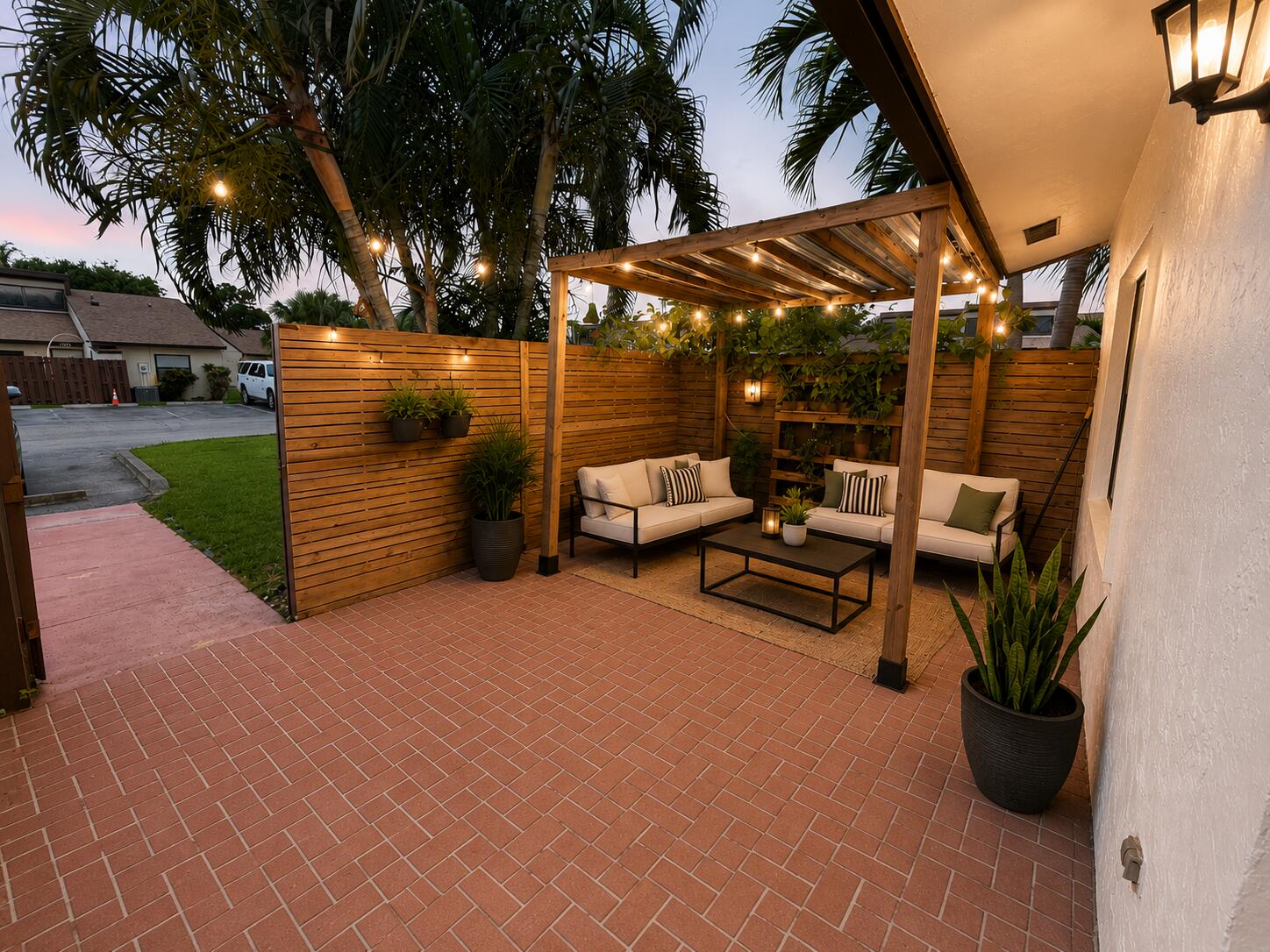 Move right into this stunning, updated 2-bedroom, 2-bathroom corner-lot villa! This light and bright home features a spacious Great Room with soaring vaulted ceilings, fresh interior paint, and brand-new blinds throughout. Fall in love with the newly renovated kitchen, showcasing premium quartz countertops and elegant, oversized white and grey tile .  Rest easy knowing the big-ticket items are completely taken care of—featuring a brand-new AC system (May 2026) and a newer roof (2024). Enjoy ultimate outdoor relaxation with your choice of private front or back patios. Excellent exterior convenience includes two dedicated parking spaces right in front of the unit. Note: Kitchen photos are AI-enhanced to showcase the spaced with brand-new stainless steel appliances were installed 06/03/26