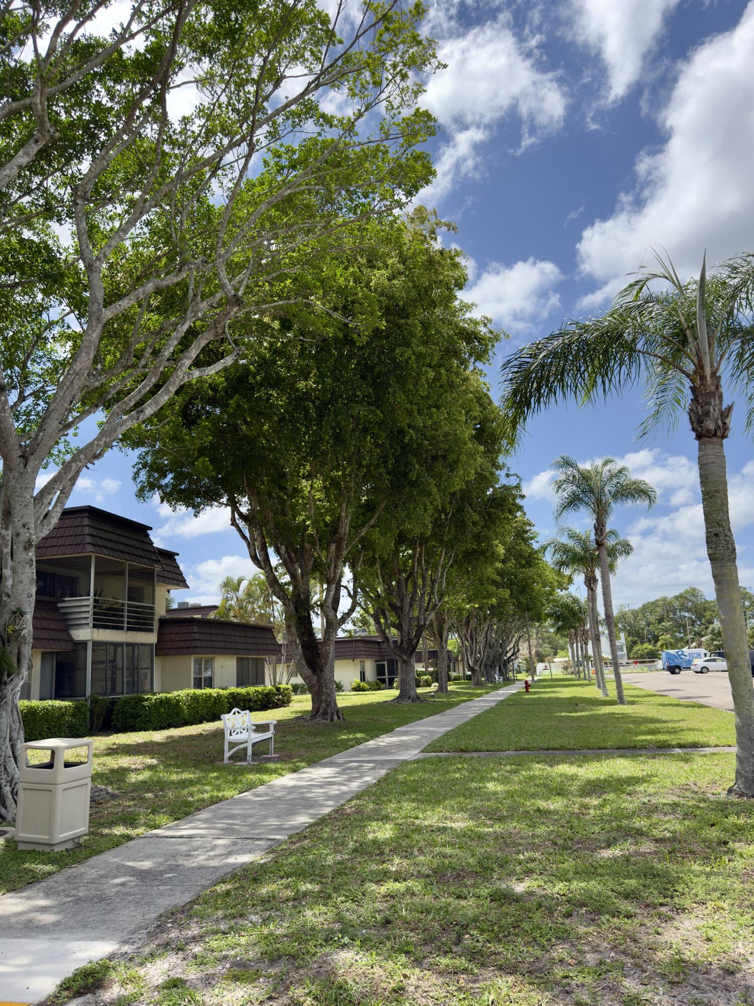 Greenway Village 1 bedroom, 1.5 bath condominium, on the ground floor,  with no one on three sides or above. This charming end unit, in need of updating, is bright, roomy and has an enclosed lanai. The community has pools, shuffleboard and a clubhouse with fitness facility. Royal Palm Beach Commons Park across the street, offers disc golf, driving range, bike and walking paths and hosts numerous events and concerts throughout the year. Close to shopping, Wellington mall, restaurants and entertainment.
