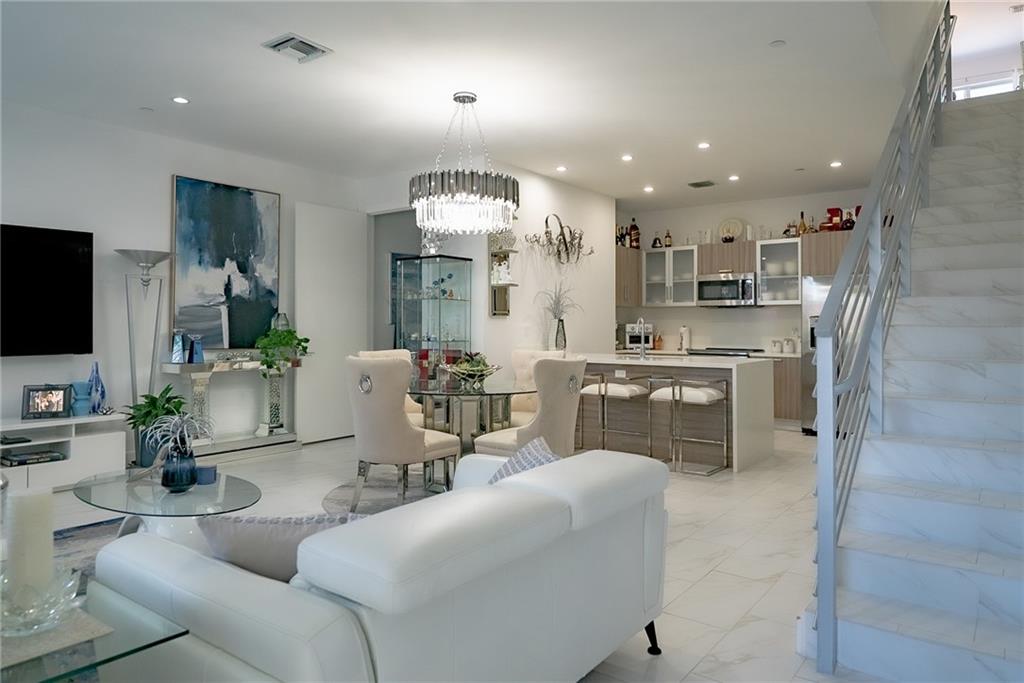 Galleria Lofts is a two-story modern townhouse in the heart of East Ft Lauderdale. This unit is meticulously maintained w/ private East & West balconies. Features include open concept floor plan, impact windows/doors, stainless appliances, 1st floor powder room, a loft area that could be easily converted to a 3rd bedroom. Master features a large balcony, giant shower, soaking tub & dual sinks. Complex has a great pool and small dog park. Situated just off Sunrise Blvd, Galleria Lofts puts you in the middle of everything in Ft Lauderdale including, 1/2 mi from the shopping at Galleria Mall, less than a mile from Ft Lauderdale Beach, minutes to Las Olas, Wilton Manors, Broward Center for the Performing Arts, Gateway Theater & the NSU Art Museum. Convenient access to I95, 595 & FLL Airport!