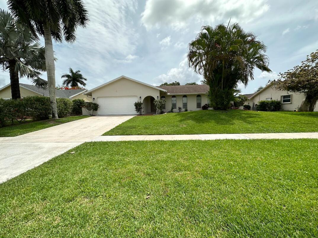 Welcome to this Wellington beauty w/water views! This 4 bedroom 2 bath POOL home is ready to welcome you home. This split floor plan has tile throughout, over 2000 sq ft of living includes Eat in Kitchen, Formal Living & Dining Rooms + Family Rm! Entertain in your Backyard Oasis overlooking scenic navigable lake to Lake Wellington! Fenced yard, Pet friendly and fast approval. Superb location - Close to WEF showgrounds, equestrian venues, dining, shopping, & medical offices, Walk to Essex Park, enjoy hosted events @ Wellington Community Center or nearby Village Park. Schedule a showing before this beauty is gone. Resident Benefit Package of $64.95 which includes Air Filters, Renters Insurance, Credit reporting of rent and more required in addition to rent.