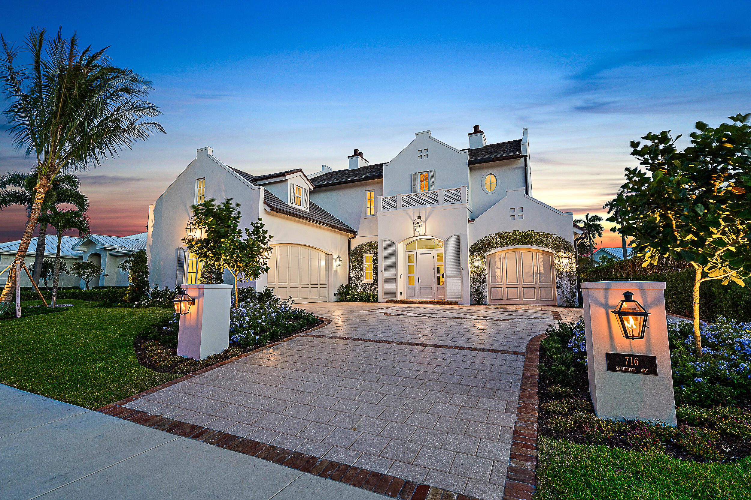 Presenting an unparalleled new waterfront residence on a 100' wide deepwater canal in the much sought after Village of North Palm Beach. Constructed by RJS Builders, ''The Cypress House'' offers timeless architecture and a flexible floor plan with 5 full bedrooms, an office and 6.5 baths.  Upon entering the foyer one is greeted with Limestone flooring, reeded glass doors to the office, a white oak staircase and soaring Pecky Cypress ceilings. With panoramic water views the first floor living area has white oak flooring, a large living room with Pecky Cypress beamed ceilings, fireplace, a dining room and a Chef's kitchen featuring custom cabinets by Palm Beach Cabinetry, a massive center island with Barbados marble counter tops, Thermador appliances including ... (See Supplement) a dual-fuel range, large pot drawers and a walk-in pantry. Adjacent to the kitchen is a full wet bar with sink and under counter wine cooler. Located on the ground floor the Primary suite offers oak flooring, beamed ceilings, two spacious walk-in closets with custom built-ins, a large bathroom with Limestone flooring, dual sinks, a large walk-in shower with a rain head and custom cabinets with Statuario marble counter tops. The four large upstairs bedrooms all have en-suite bathrooms, secondary laundry and three of them have access onto an expansive open balcony. 
The large, covered lanai overlooking the pool and water offers ample seating area, Cypress ceilings and a summer kitchen with 36" gas grille and sink. The saltwater pool is surrounded by a tabby shell stone deck, has a pool heater/chiller and automation via iPhone.  The deepwater dock has Trex decking and a 24,000lb lift. Other features include all impact doors & windows, a 48kw full house generator, 3 car garage with ability for lifts to make 5 car capacity, EV charger, an automated motor-driven staircase giving access to a large storage room in the attic, Cat 6 throughout, interior and exterior speakers with Sonos, smart home iPad controls, 4" LED can lighting throughout, all copper exterior light fixtures and prepped for 4 soffit cameras.

Enjoy the recently renovated North Palm Beach Country Club with its Farmer's Table restaurant and bar, redesigned Jack Nicklaus Signature Golf Course, Tennis Center with Har-Tru courts and an Olympic Swimming Pool.