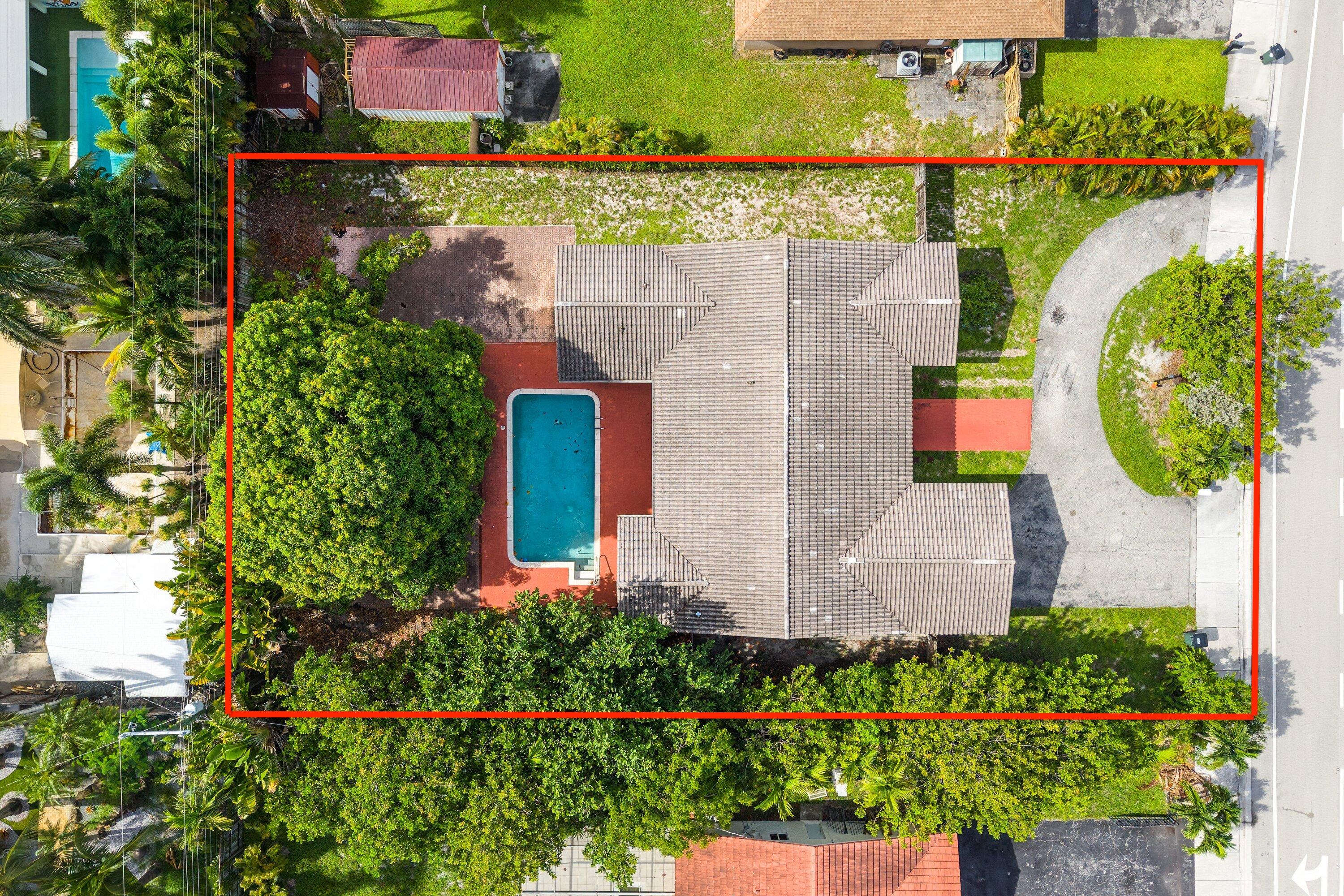 Prime East Boca opportunity! This 6 bedroom, 4 bath pool home sits on an oversized 0.37-acre lot offering incredible potential for investors, builders, or buyers looking to create their dream home. Renovate the existing residence or explore the possibilities of new construction. Zoned R-1-C, permitting residential use and, with City approval, certain conditional non-profit uses (Sec. 28-340) such as school or child/adult care. Property also offers strong rental income potential, seasonally, annually. The garage conversion provides additional living space and can easily be converted back to a garage. NO HOA. Unbeatable location near FAU, Mizner Park, Bright line station, major highways, beautiful beaches, parks, shopping, dining, and A-rated schools. Call today to schedule a showing.