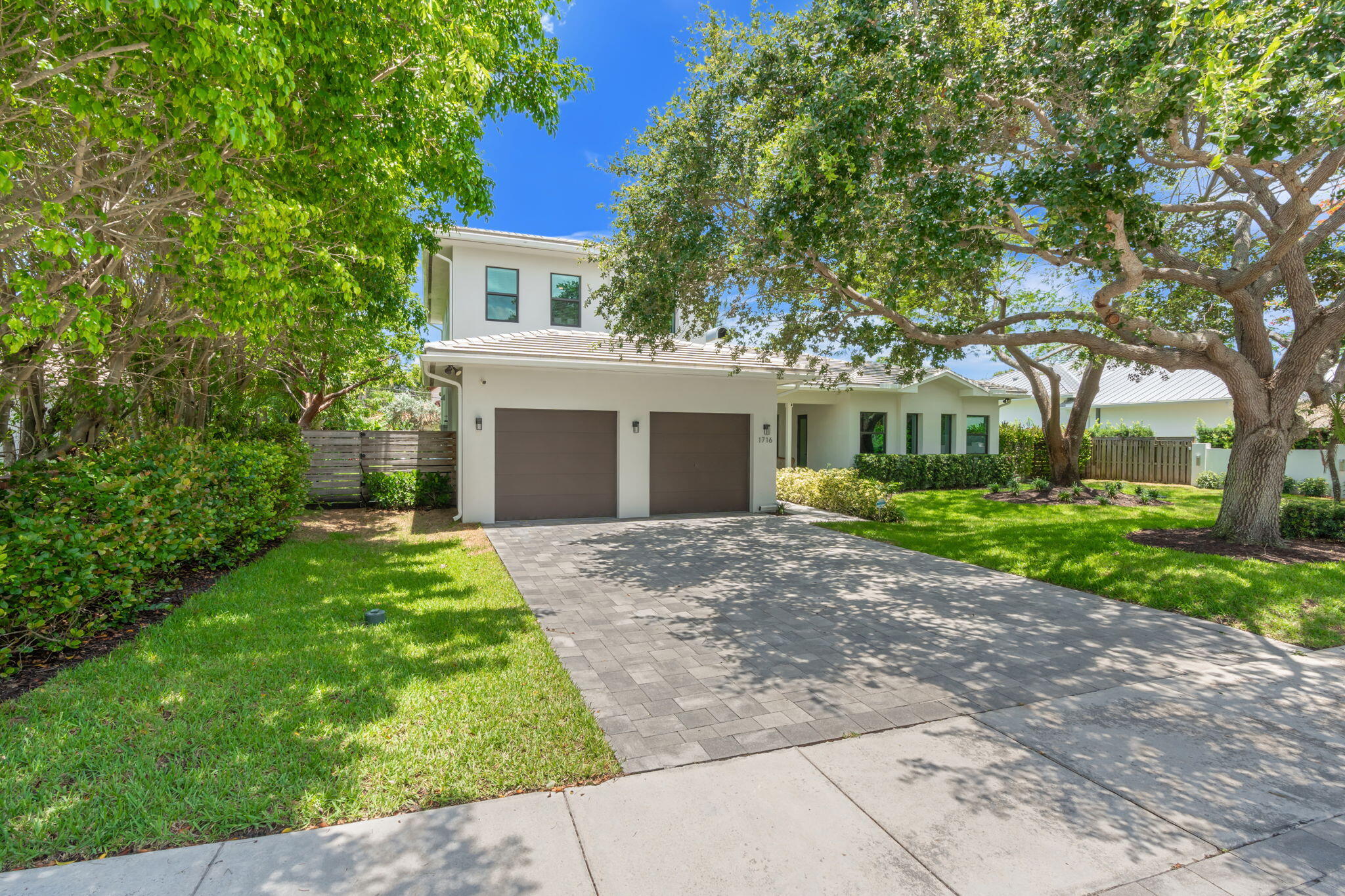 This Stunning Coral Ridge Home Blends Modern Luxury w/ Exceptional Quality & Design. Featuring Soaring Cathedral Ceilings, Open Floor Plan, Real Wood Floors, Impact Windows/Doors, Pocket Sliders Opening To Covered Travertine Patio, Pool & Spacious Fenced Backyard. Gourmet Kitchen Offers Custom Cabinetry, Cambria Quartz Counters, Center Island Seating & Premium Thermador/Kitchenaid Appliances. First-Floor Primary Suite Opens To Pool & Features Dual Custom Closets & Spa-Like Bath. A Truly Turnkey Property Showcasing Quality Craftsmanship, Timeless Design, And Exceptional Attention To Detail Throughout.