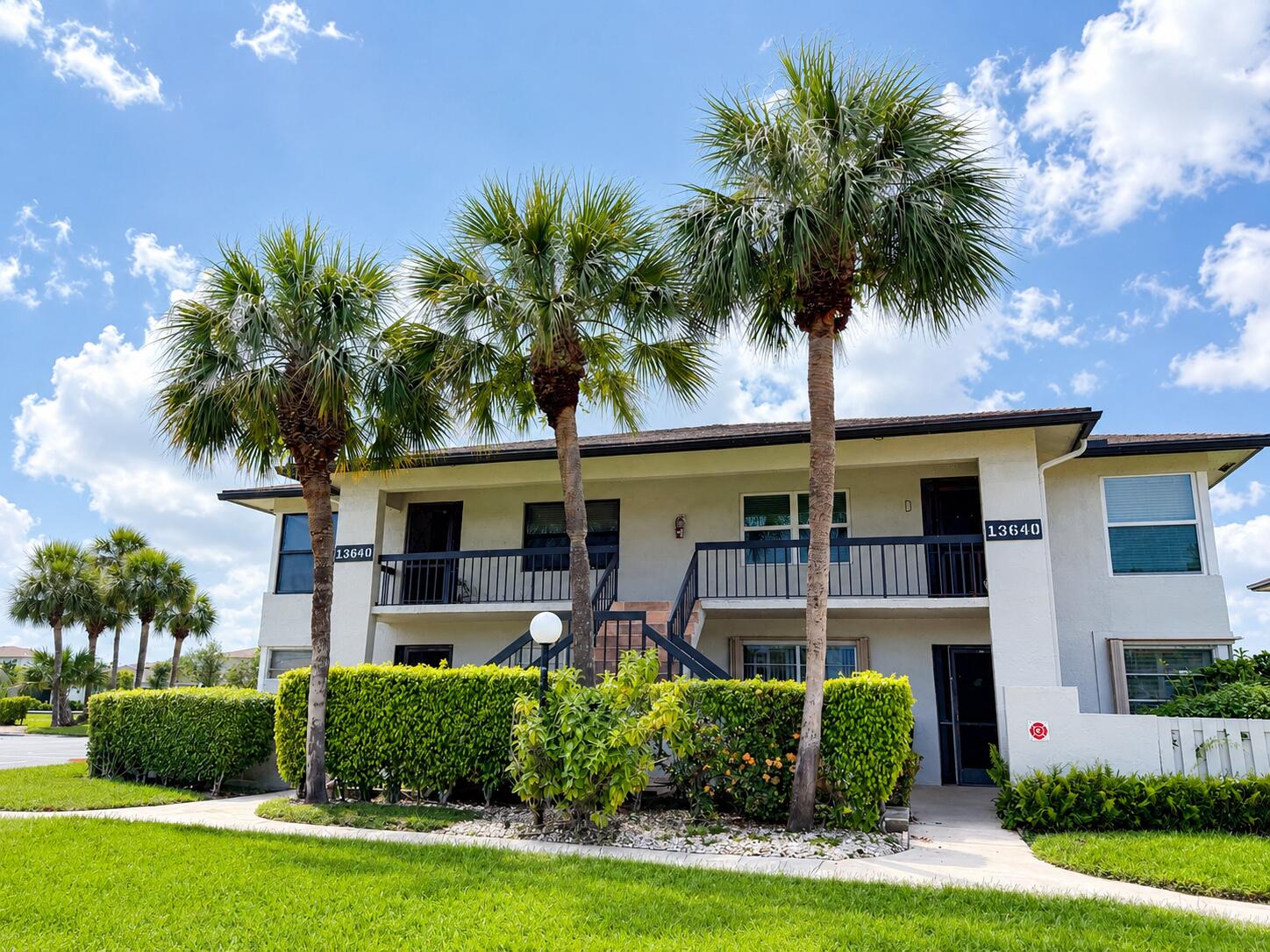 Beautifully updated 2-bedroom, 2-bathroom second-floor condo in the desirable 55+ community! This move-in-ready home offers 1,205 SF of bright living space, featuring a renovated kitchen with granite countertops, white cabinetry, stainless steel appliances, tile flooring throughout, and an in-unit washer & dryer. Enjoy the open balcony overlooking lush tropical landscaping—the perfect place to enjoy fresh air and Florida's beautiful outdoor lifestyle. Rent includes water and internet. Enjoy resort-style amenities, including a clubhouse, pool, fitness center, tennis and pickleball courts. Conveniently located just minutes from shopping, dining, medical facilities, Atlantic Avenue, and Delray Beach's beautiful beaches. Available for annual lease. Schedule your private showing today! One assigned parking space plus ample guest parking.