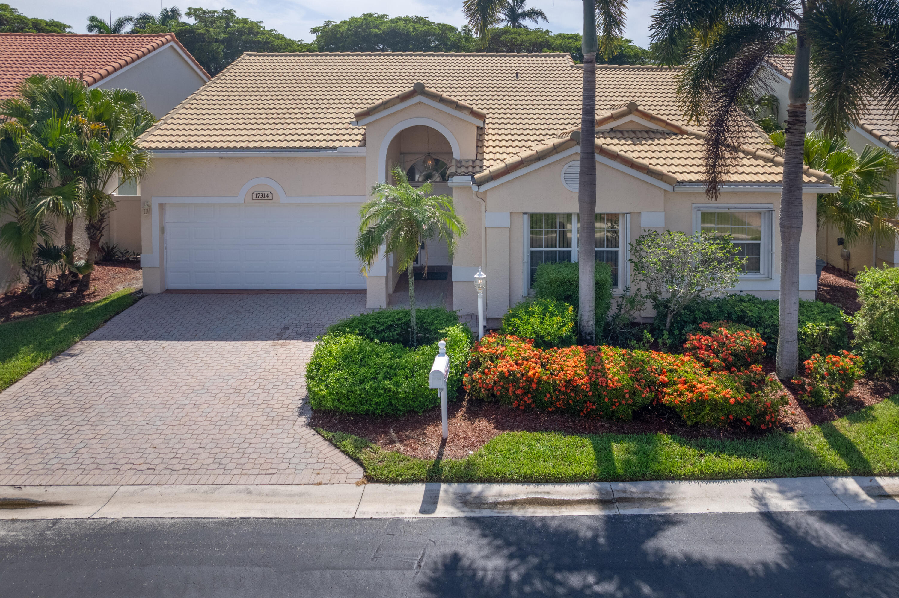 Move-in clean and attractively priced, this well-maintained 3-bedroom, 2-bath home offers the perfect opportunity to add your personal style. Located in the desirable Balboa Point community of Boca Country Club, you'll enjoy the Boca lifestyle with no mandatory country club membership fees. HOA amenities include 24-hour guard-gated security, lawn and landscape maintenance, sprinkler head maintenance, exterior painting, roof pressure cleaning, and a community pool just steps from your door. With over 1,800 square feet under air, a 2-car garage, and a spacious screened patio, this home is ready for its next owner.