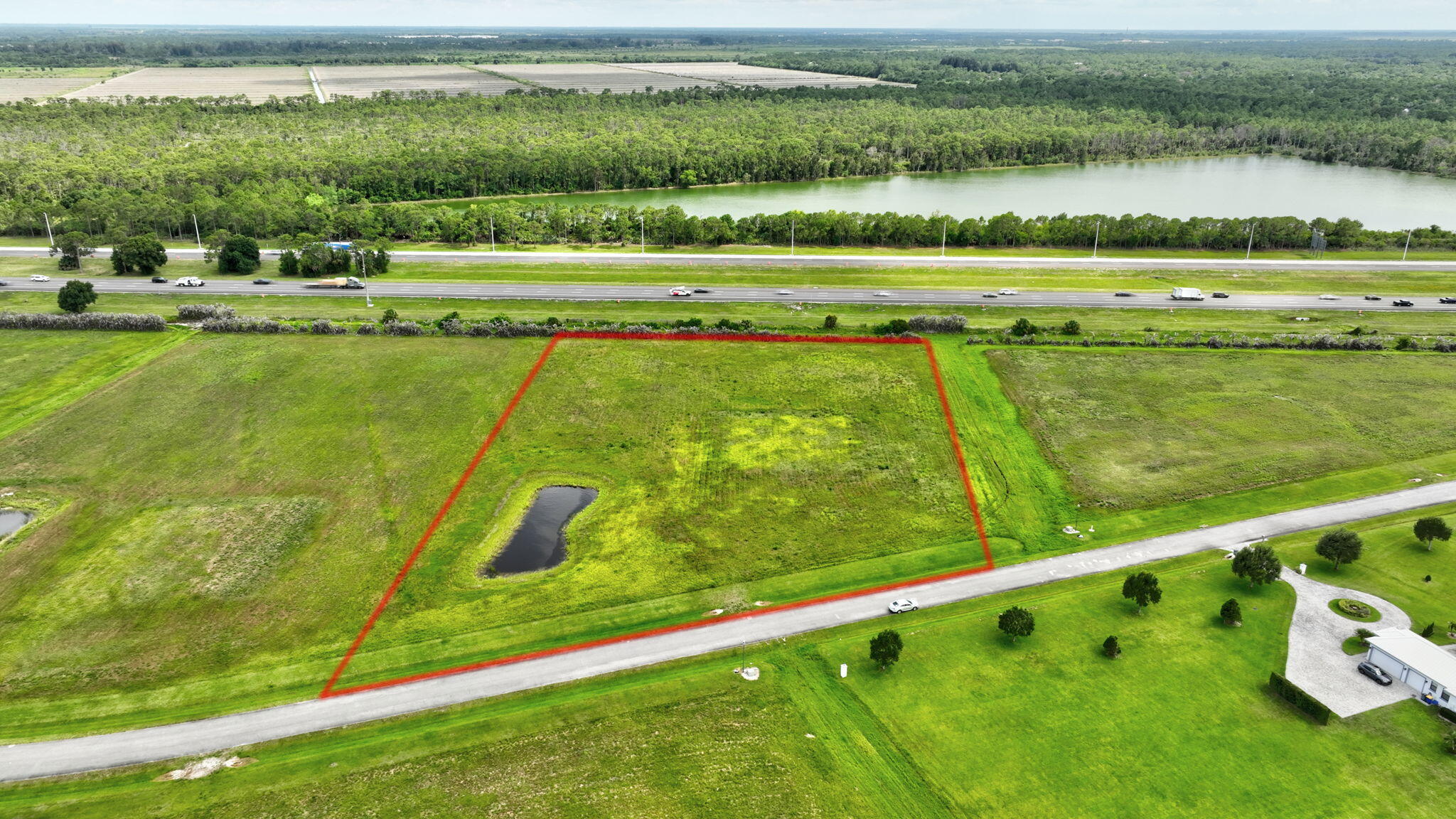 An extraordinary opportunity to create a private luxury estate in the highly sought-after Fox Run section of Meadow Run, one of Palm City's premier gated acreage communities. Situated on 5.01 picturesque acres in Palm City Farms, this exceptional homesite offers the perfect canvas to bring your vision to life. Surrounded by custom estate residences and mature natural beauty, this property provides the space, privacy, and flexibility today's buyers desire. Design a custom dream home, private guest house, detached garages, workshop, RV storage, equestrian facilities, riding arena, resort-style pool, or family compound—all while enjoying the tranquility of country living.  Fox Run is renowned for its estate-sized homesites, equestrian-friendly lifestyle, and exclusive gated setting. With a minimum 3,000-square-foot home requirement, the community maintains its upscale character and long-term value. Bring your horses and enjoy wide-open spaces rarely available in Martin County.  Despite its peaceful setting, you're only minutes from top-rated Martin County schools, championship golf, marinas, waterfront dining, shopping, medical facilities, and the charming downtown areas of Stuart and Palm City. Easy access to I-95 and Florida's Turnpike provides convenient travel throughout South Florida.  Opportunities to build on 5-acre parcels in Fox Run are increasingly rare. Secure your place in one of Palm City's most desirable luxury acreage communities and create a legacy property that can be enjoyed for generations to come.