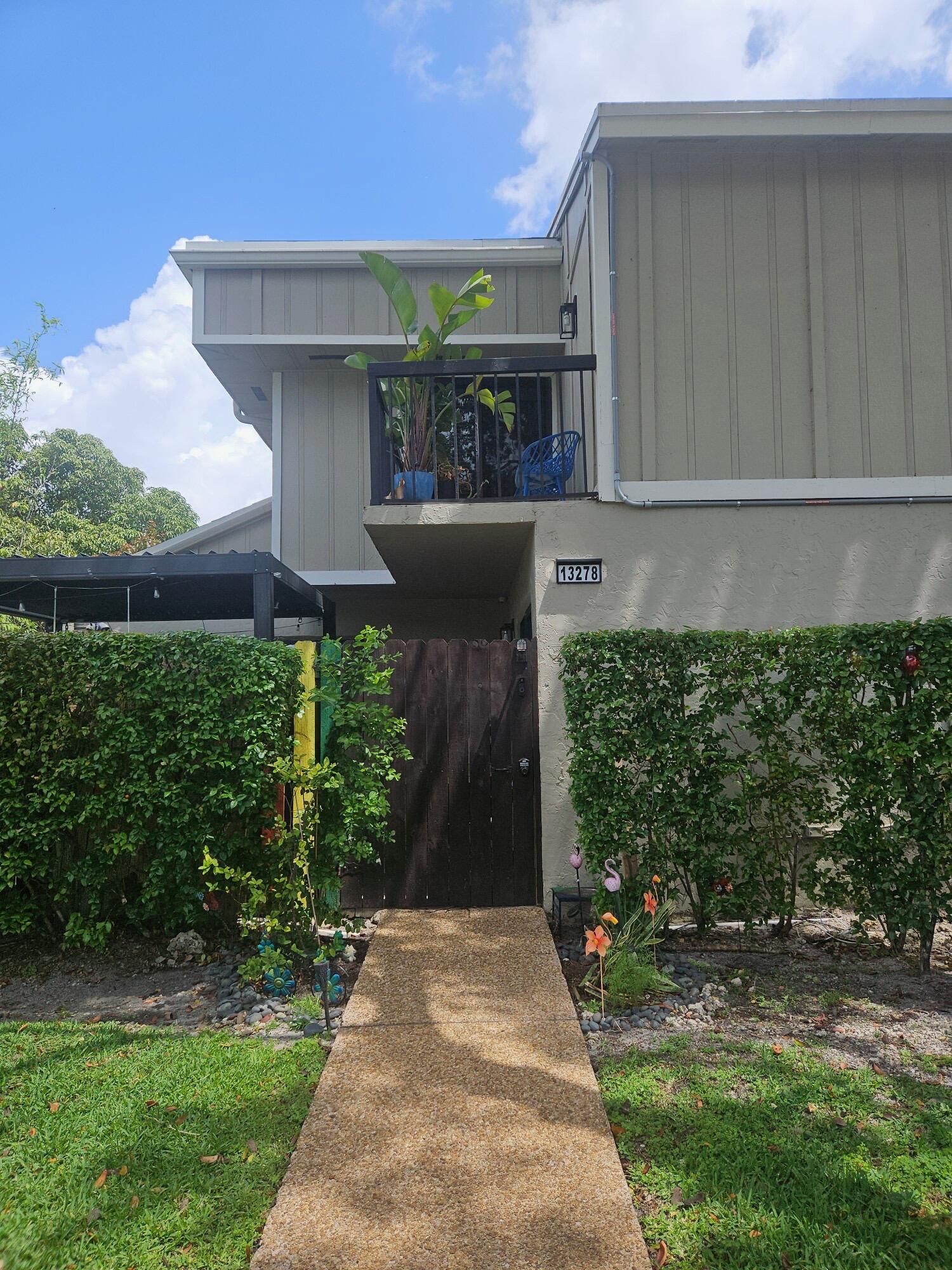 Discover comfort, charm, and smart living in this beautiful 2-bedroom, 1.5-bath townhome in the highly desirable Plantation area! Step into a spacious living area that flows seamlessly into an open-concept kitchen and dining space—perfect for everyday living and entertaining. Upstairs spacious bedrooms offer comfort and privacy for all. Enjoy your own private outdoor oasis featuring a lush garden with fruit trees, vegetables, and colorful flowers, ideal for relaxing or hosting friends. This pet-friendly community welcomes your furry companions. With a strong focus on property value preservation, the HOA covers roof repair/replacement, exterior insurance, and common area landscaping—ensuring peace.