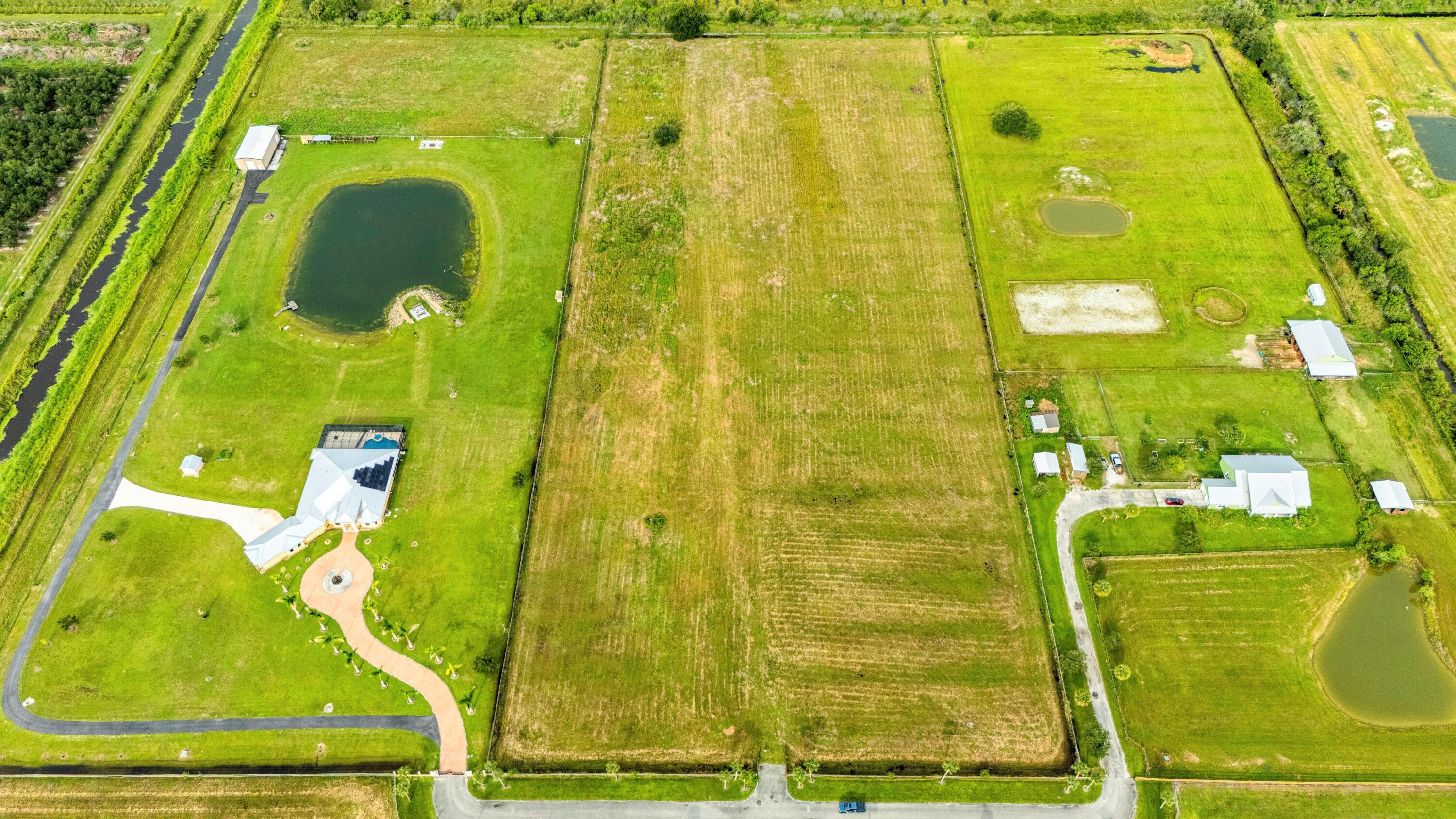 RARE OPPORTUNITY to OWN 10 CLEARED and FENCED ACRES in the Desirable Southern Star Stables Subdivision of Western Fort Pierce!! This parcel is ready for your vision with wide-open usable land, perimeter fencing, underground electric fed to the front of the property, a regular well with pump, and a clear artesian well on site. Build your custom estate, create an equestrian setup, or enjoy peaceful country living with room for horses, barns, equipment, RVs, trailers, and toys. Southern Star Stables offers privacy, space, and a rural setting while still convenient to Fort Pierce, Port St. Lucie, I-95, and the Turnpike. Bring your horses, house plans, and country-living dreams to one of western St. Lucie County's acreage communities. A Great Head Start Compared to Raw Land!