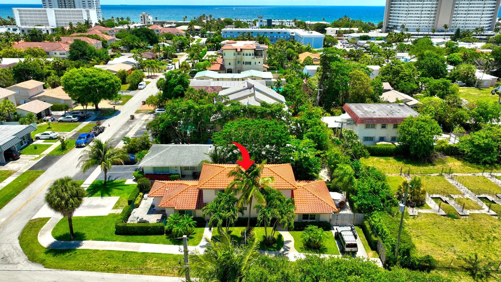 LOCATION, LOCATION! TURN-KEY TOWNHOMES! RARE opportunity to own an exceptionally maintained, two-story duplex just blocks from Deerfield Beach! Both units feature identical, mirrored 2BR/2BA split-bedroom layouts with private backyards, individual laundry, and dedicated parking.  INVESTMENT HIGHLIGHTS: Live in one side and rent the other, short-term rental, or hold as a high-performing income asset. Situated in a prime, rapidly growing area directly across from luxury Intracoastal homes.  UPGRADES & FEATURES: Complete impact windows/doors, water heaters 2024 & 2026, AC units 2019, and a 2015 roof. Professionally landscaped & exterior paint completed in 2022.  Unlimited potential to build new or hold a premier coastal property with massive upside! Please do not disturb tenants.