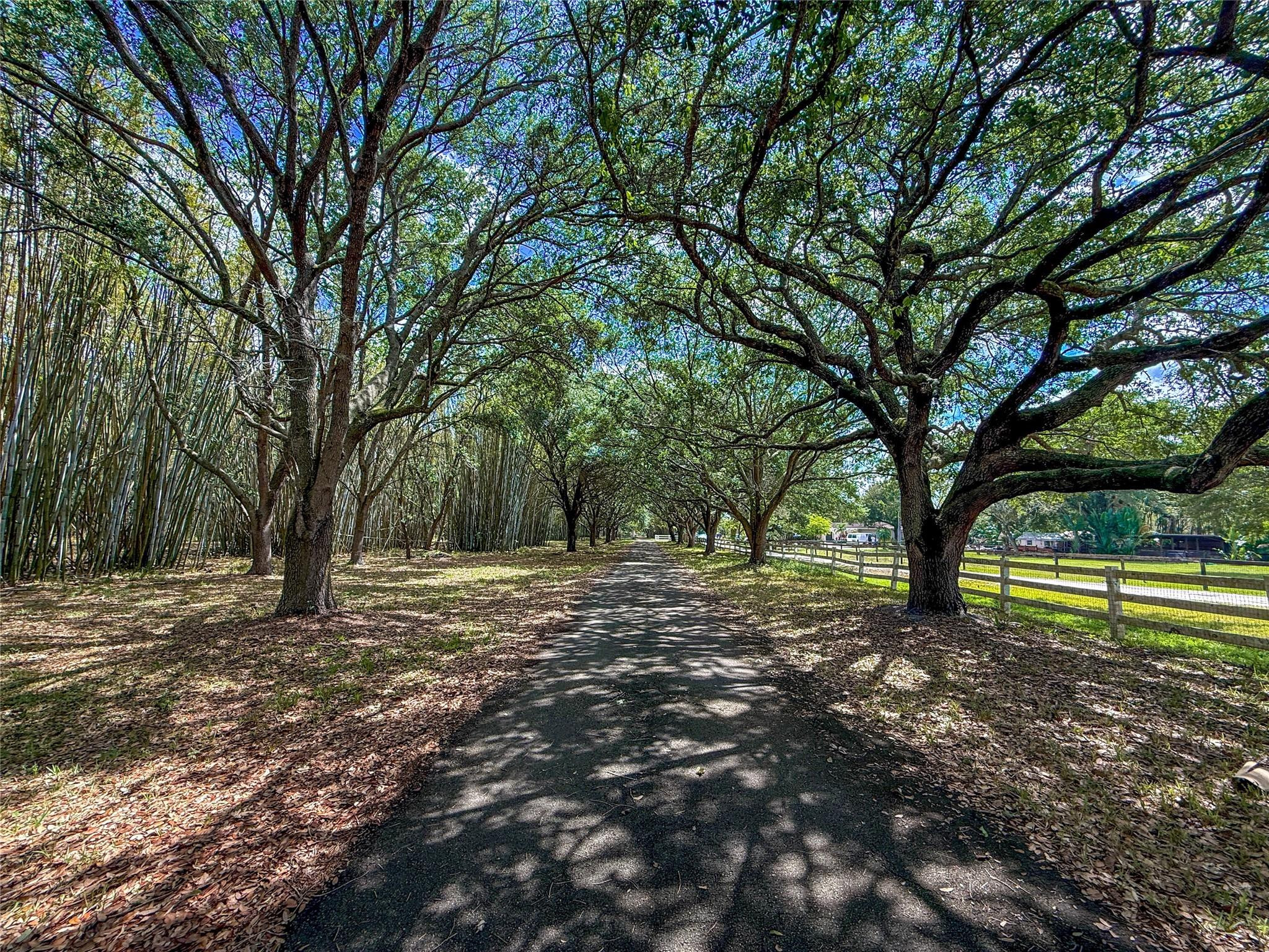 ***A ONCE-IN-A-LIFETIME OPPORTUNITY ON PRESTIGIOUS HANCOCK ROAD!!!*** WELCOME TO ONE OF THE LAST REMAINING MULTI-ACRE ESTATES ON COVETED HANCOCK RD IN SUNSHINE RANCHES! SPANNING 8.46 ACRES+/-,THIS RARE OFFERING COMBINES EXCLUSIVITY,SCALE&UNMATCHED POTENTIAL. DON’T LET THE RURAL CHARM FOOL YOU,SW RANCHES IS QUICKLY BECOMING THE “HAMPTONS OF SOUTH FLORIDA,”W/OVER 18 MEGA MANSIONS CURRENTLY BUILT,IN FOR PERMIT,OR UNDER CONSTRUCTION. THIS PROPERTY BOASTS 294' OF FRONTAGE& 1,251' OF DEPTH, W/A PICTURESQUE OAK TREE-LINED D/W WELCOMING YOU HOME. IT'S HIGH AND DRY,W/CITY WATER &NO WETLANDS-AN IDEAL CANVAS TO DEVELOP. EXISTING 3,076 SF HOME (4BD/3BA) IS BEING SOLD AS-IS. REPLATTING ALLOWS FOR DIVISION INTO 3 BUILDABLE LOTS (MINIMUM 2 ACRES EACH),MAKING THIS A IDEAL FOR A DREAM-HOME/FAMILY COMPOUND.