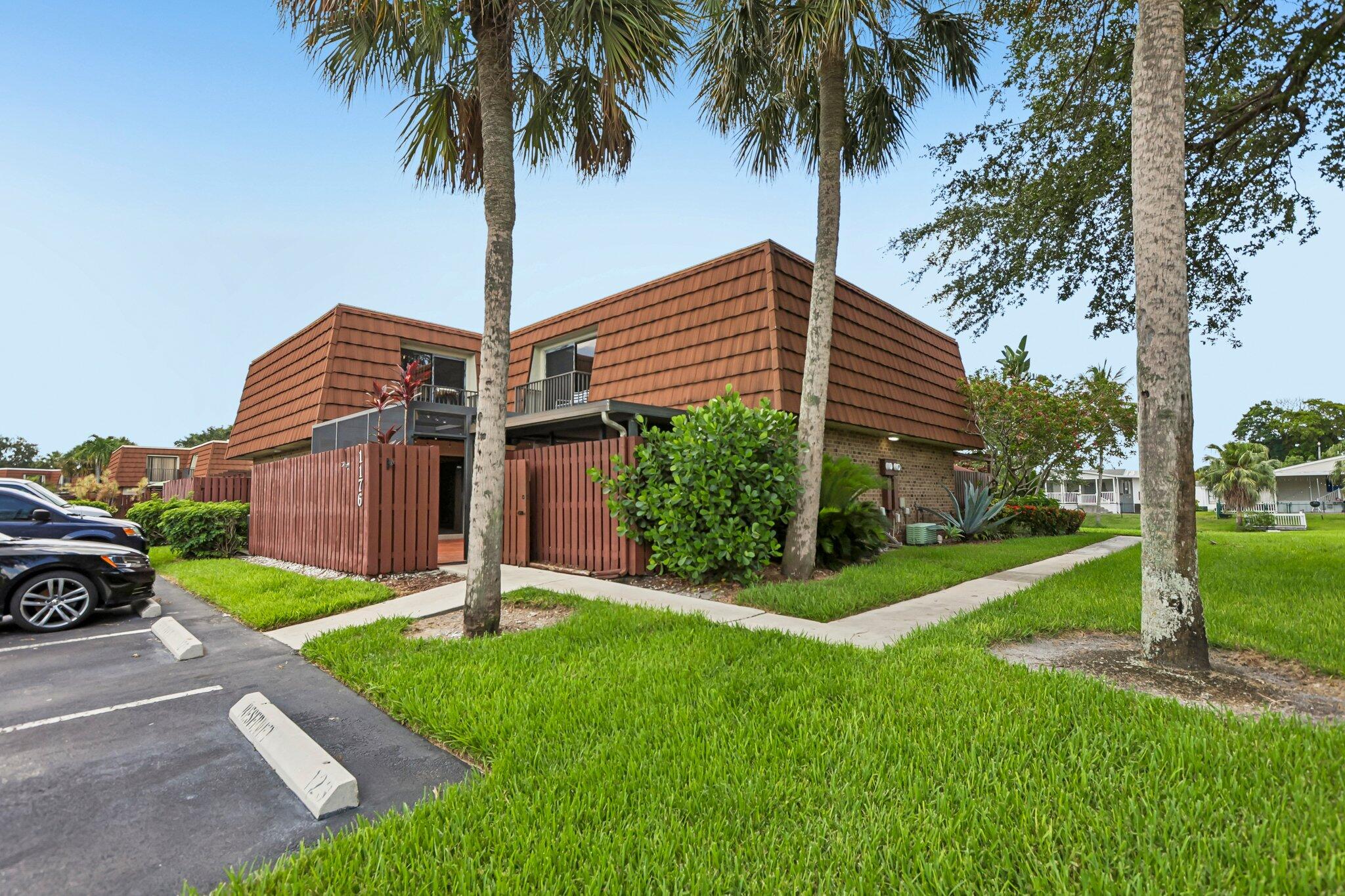 Welcome to this charming 3-bedroom, 2.5-bathroom townhouse located in the Village of Lake Pine II community of Davie. Spanning 1,654 square feet of living space across two stories, this residence offers comfortable and efficient floor plan design. There is one bedroom and 1/2 bath downstairs and 2  bedrooms and  2 bathrooms upstairs to provide flexibility for various living arrangements. The updated kitchen boasts granite counter tops, wood cabinets, and black & SS appliances.  There is tile flooring throughout the main areas. Screened-in patio has a large storage area. Close to top rated schools. The association maintains the roof. Community amenities include pool, play area, bbq and basketball. Don't miss this one!