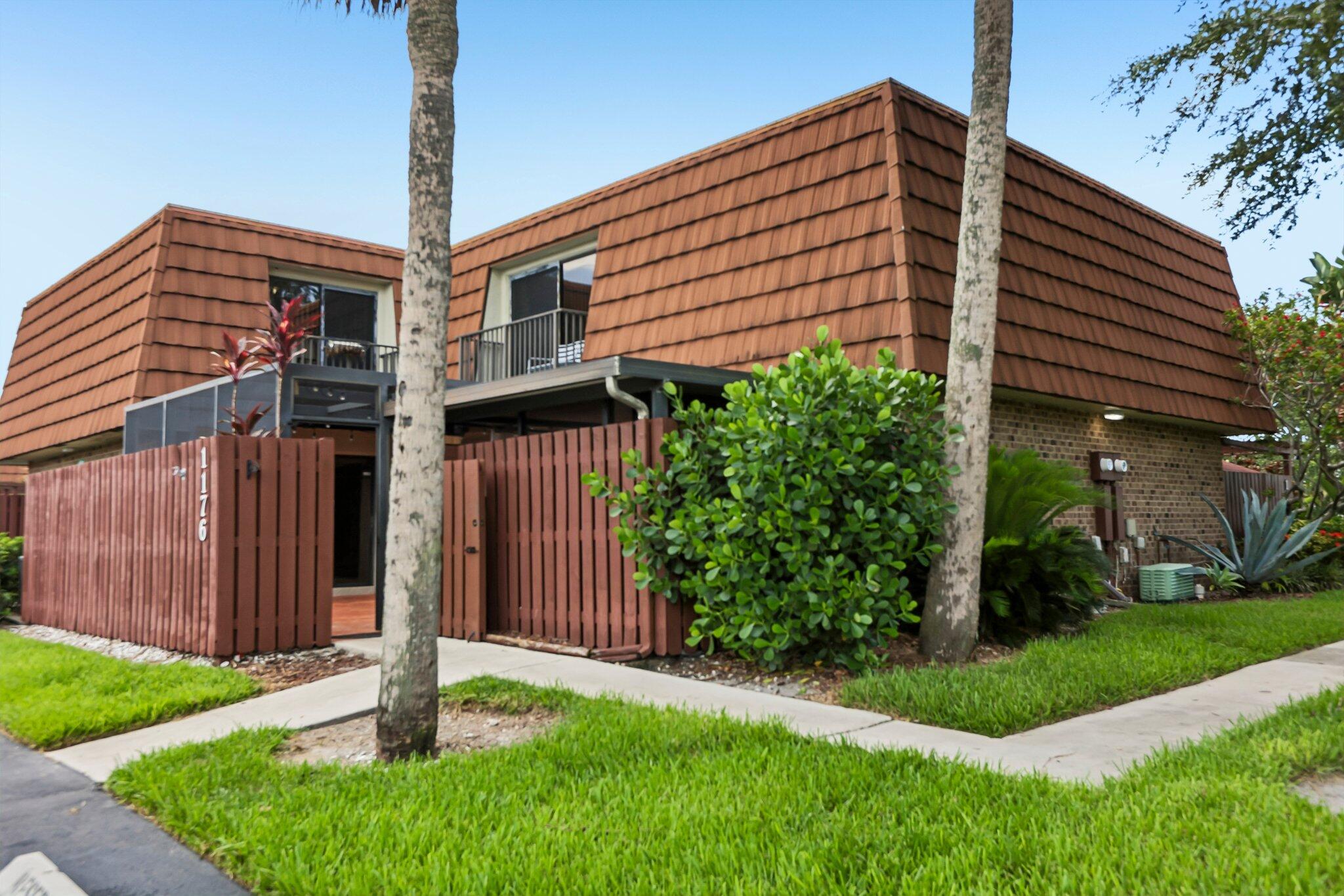 Welcome to this beautifully maintained 3-bedroom, 2.5-bath townhouse in the desirable Village of Lake Pine II community. Offering 1,654 square feet of thoughtfully designed living space, this two-story home features a flexible floor plan with a first-floor bedroom and half bath, perfect for guests, a home office, or multigenerational living. The updated kitchen is equipped with granite countertops, rich wood cabinetry, and a combination of stainless steel and black appliances, opening to spacious living and dining areas with durable tile flooring throughout the main level. Upstairs, you'll find two generously sized bedrooms, including the primary suite with an en-suite bath. Step outside to your private screened-in patio, ideal for relaxing or entertaining, complete with a large storage  room for added convenience. Enjoy the benefits of low HOA fees while the association maintains the roof, helping reduce long-term maintenance costs. Residents also have access to fantastic community amenities, including a swimming pool, basketball court, BBQ area, playground, and beautifully maintained common areas. Located in the heart of Davie, this home is just minutes from top-rated schools, Nova Southeastern University, Broward College, shopping, dining, parks, major highways, Fort Lauderdale Airport, and beautiful South Florida beaches.