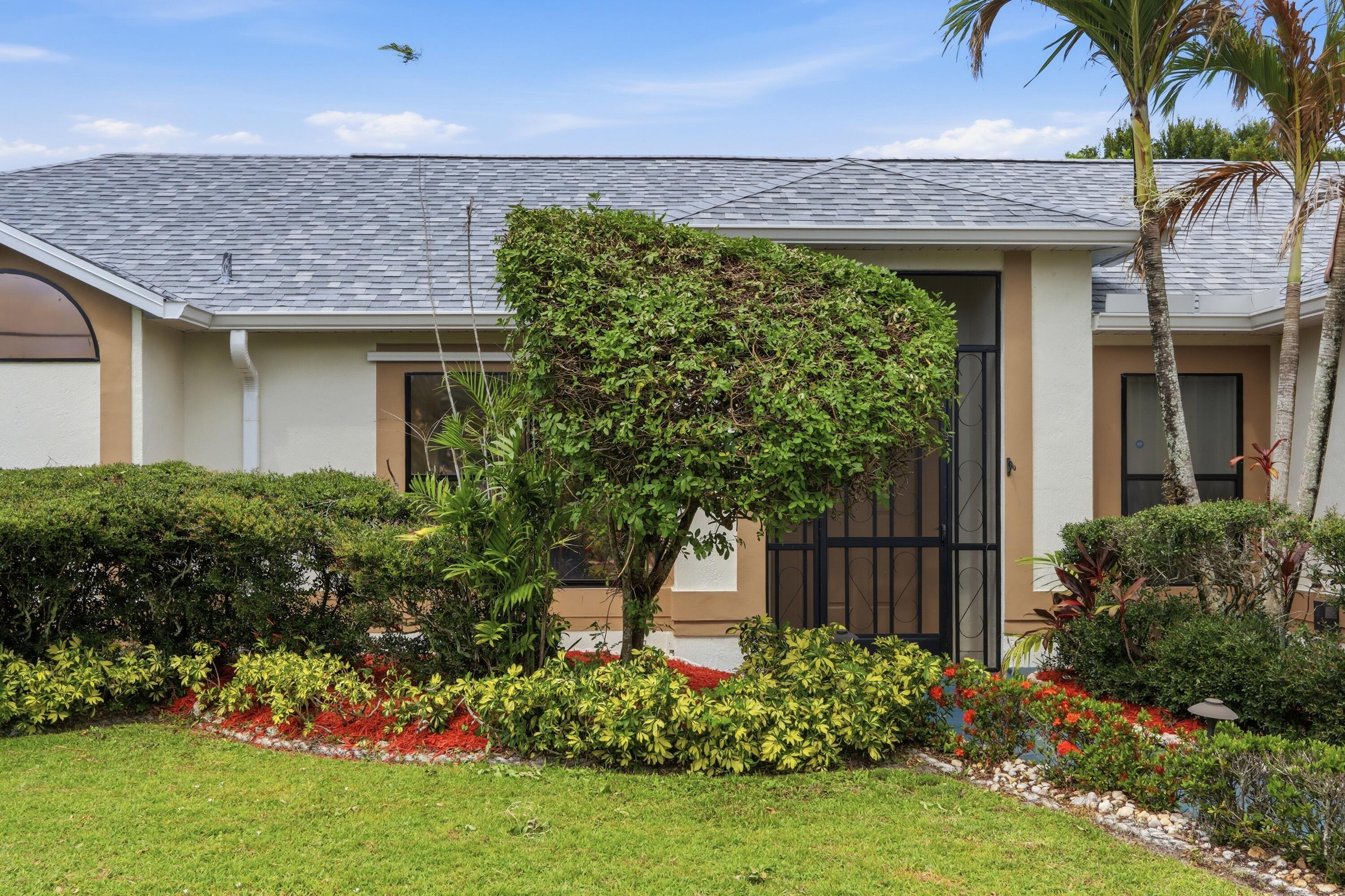 Welcome to this lovely single-story residence located in a well-kept, non-HOA community in Port St Lucie. Pride of ownership is evident from the moment you step through the door.  This generous home offers 1,536 square feet of comfortable, open living space with three bedrooms and two full bathrooms. A two-car garage provides ample vehicle space, and room for any storage you need. The garage is also excellent as a workshop, with its screen system to let in light and air-flow. Lush landscaping adds to the warm embrace of the home, and the backyard opens to a canal, perfect for casting a line or taking a small vessel for a spin. The roof was replaced in 2025, and other recent updates include all new flooring, a new kitchen, gutters, sprinklers, and a/c. This is a "good one"!