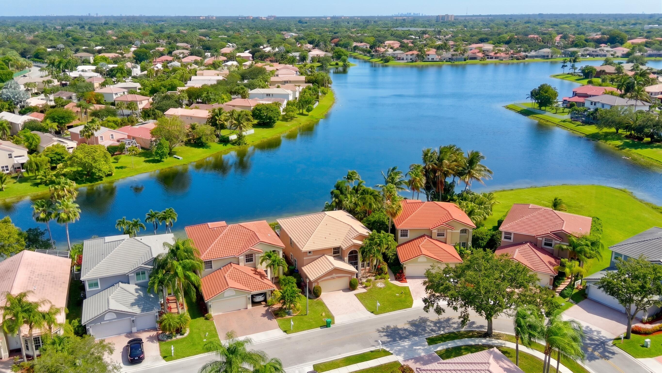 Welcome to this stunning 4-bedroom, 3-bathroom residence in Coral Springs. Spanning 2,856 square feet of finished living space across two stories, this single-family home offers ample room for comfortable living. The two-car garage provides convenient vehicle storage and protection. As a waterfront property, this home presents a unique opportunity to enjoy serene water views and outdoor living with a fully fenced in backyard. Located in a wonderful gated community, come and see this home and make it yours! Owner offering a $20,000 credit towards a new roof at closing.