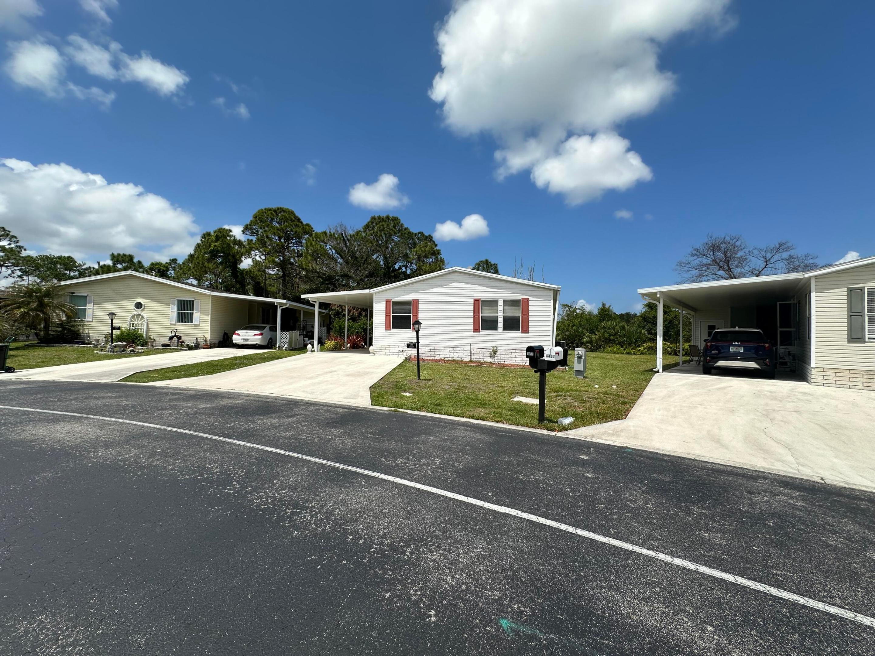 Spacious and beautifully maintained 2-bedroom + den manufactured home offering 1,512 sq. ft. under A/C, located in the desirable 55+ community of Pinelake Gardens & Estates in South Stuart. This home features a split-bedroom floor plan for added privacy and a wide-open great room with a large dining area, perfect for entertaining. The light-filled kitchen offers abundant cabinet space, a large pantry, and an adjoining morning room with laundry for added convenience. Step outside to a generous screened room overlooking a peaceful preserve, an ideal spot to relax and enjoy the outdoors. The primary suite is roomy and inviting, complete with a walk-in closet and an ensuite bath featuring dual vanities, and a step-in shower. The second bedroom and ... (see supplement for full remarks) Spacious and beautifully maintained 2-bedroom + den manufactured home offering 1,512 sq. ft. under A/C, located in the desirable 55+ community of Pinelake Gardens & Estates in South Stuart. This home features a split-bedroom floor plan for added privacy and a wide-open great room with a large dining area, perfect for entertaining. The light-filled kitchen offers abundant cabinet space, a large pantry, and an adjoining morning room with laundry for added convenience. Step outside to a generous screened room overlooking a peaceful preserve, an ideal spot to relax and enjoy the outdoors. The primary suite is roomy and inviting, complete with a walk-in closet and an ensuite bath featuring dual vanities, and a step-in shower. The second bedroom and full bath are located on the opposite side of the home, providing privacy for guests. The versatile den, with French doors is perfect for a home office, hobby room, or additional sleeping space. Pinelake Gardens & Estates offers resort-style amenities, including two clubhouses, two heated pools and spas, fitness centers, a library, tennis and pickleball courts, bocce, and a wide variety of clubs and social activities. Conveniently located just minutes from ocean beaches, shopping, dining, and entertainment. Pet-friendly community, two large dogs allowed. Monthly lot rent includes lawn care, trash service, on-site management, and full access to recreational facilities. All information provided is believed to be reliable; however, it is not guaranteed and is subject to errors, omissions, and changes without notice. Buyers should independently verify all information. All measurements are approximate estimates